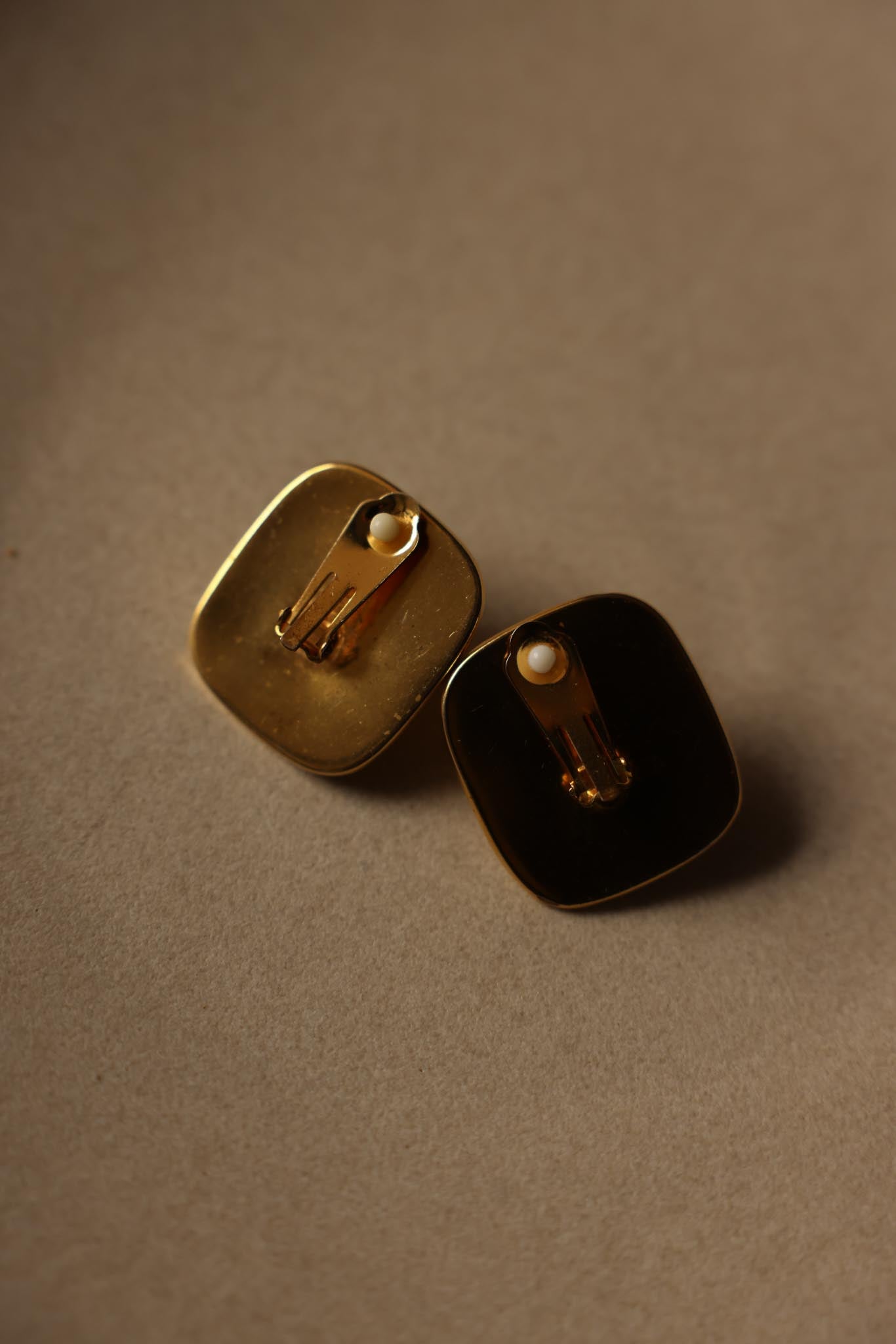 Gold-Tone Hammered Square Clip-On Earrings with White Cabochons – 1980s