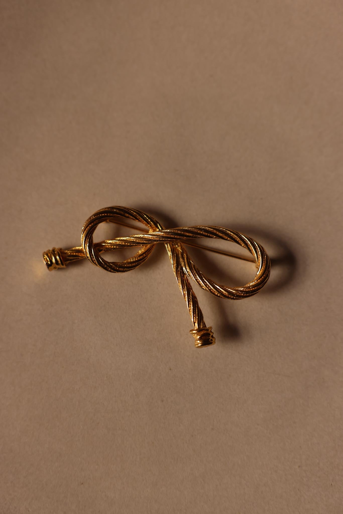 Golden Bow Rope Brooch