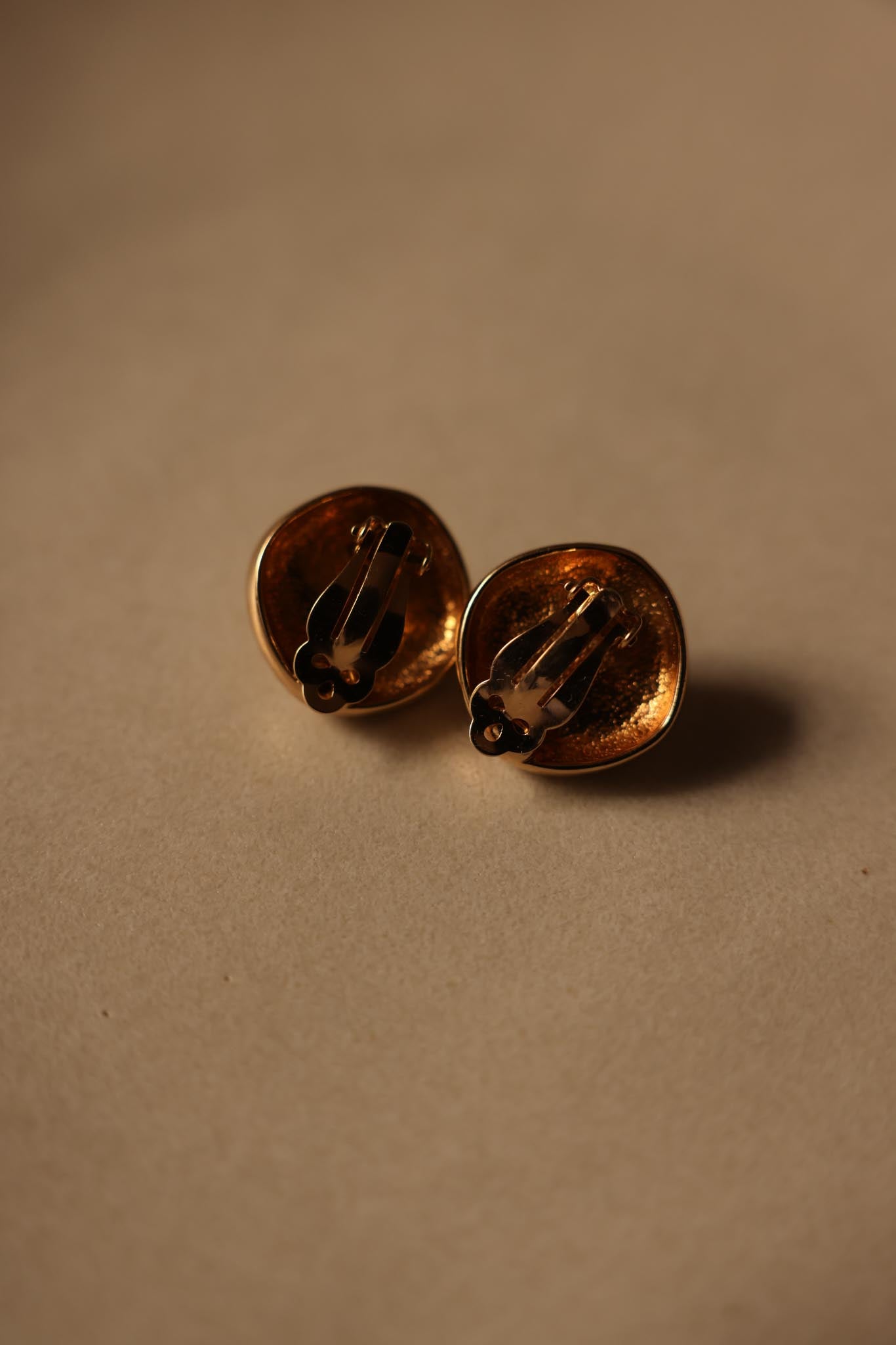Gold-Tone Clip-On Earrings with Purple Cabochon