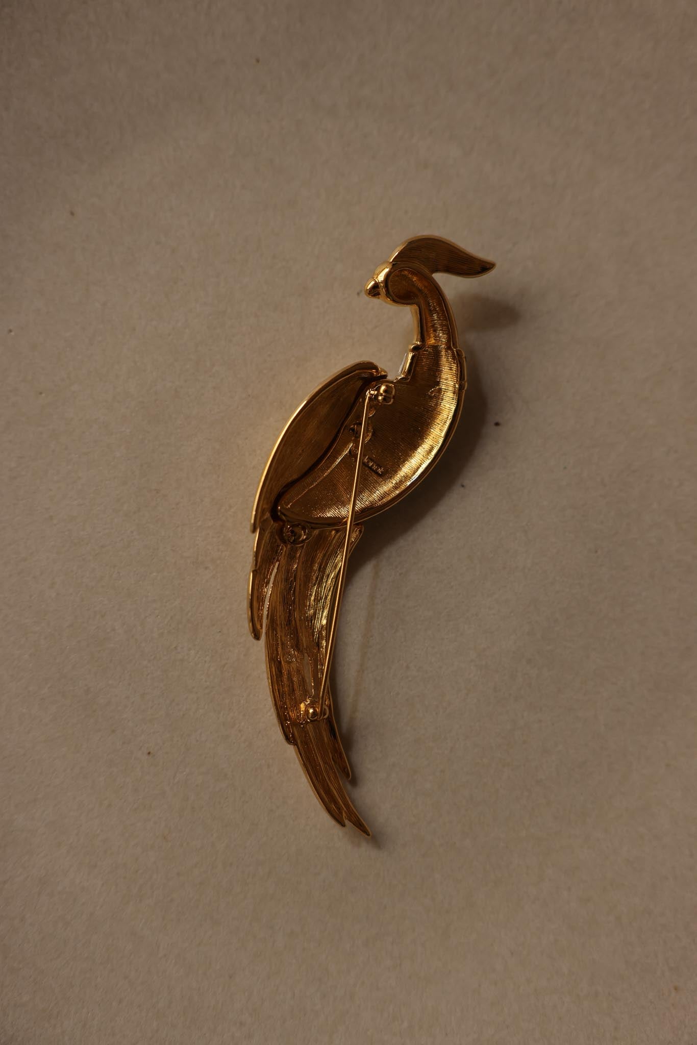 MONET Gold-Tone Rhinestone Peacock Brooch