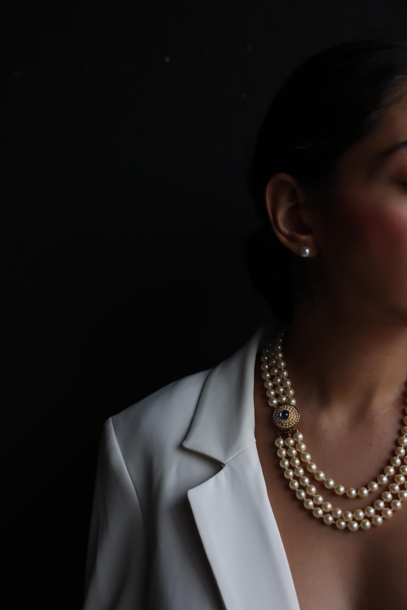 Gold-Tone Triple-Strand Faux Pearl Necklace with Blue Rhinestone Clasp