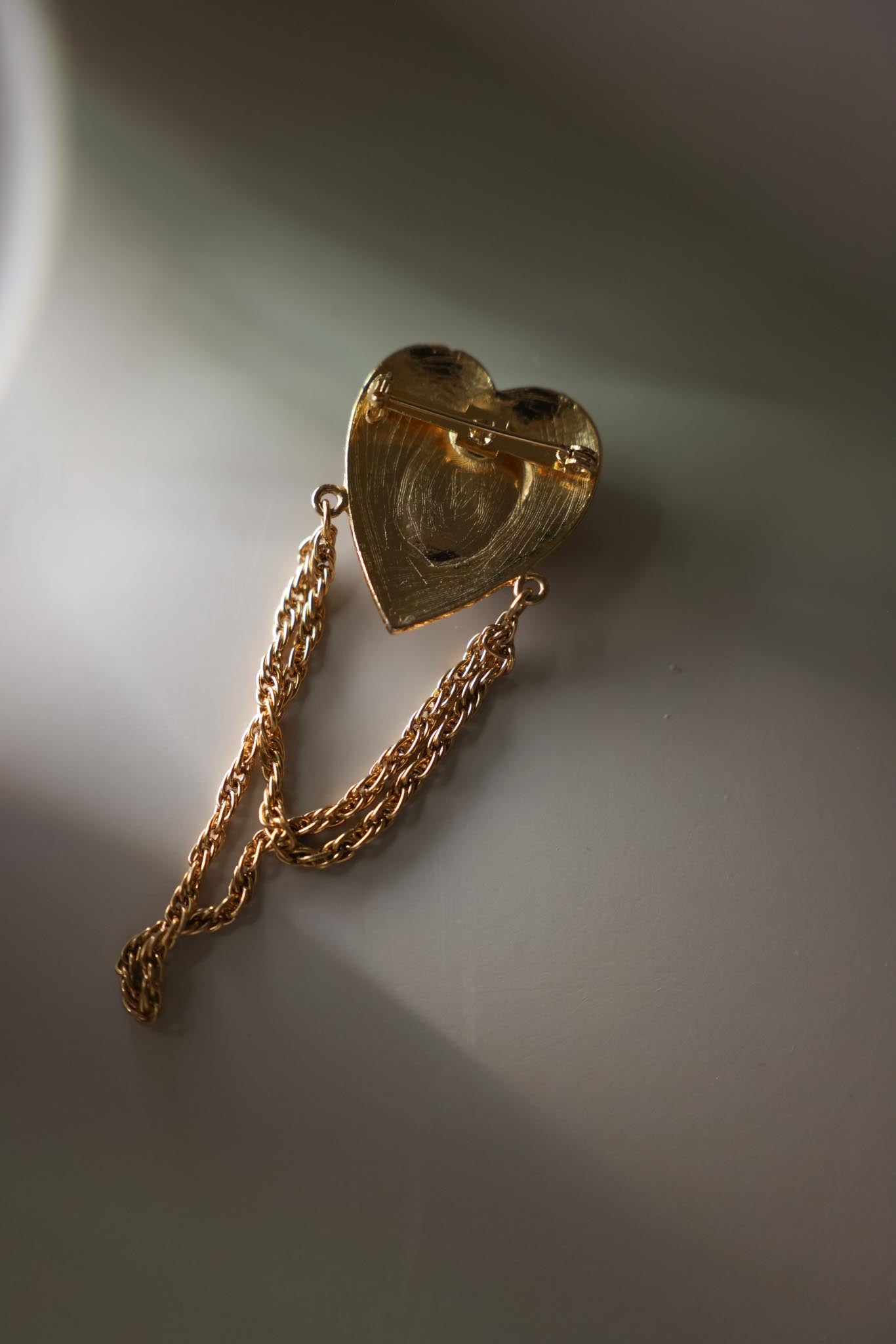 Gold Tone Heart Chain Drape Brooch With Green Cabochon