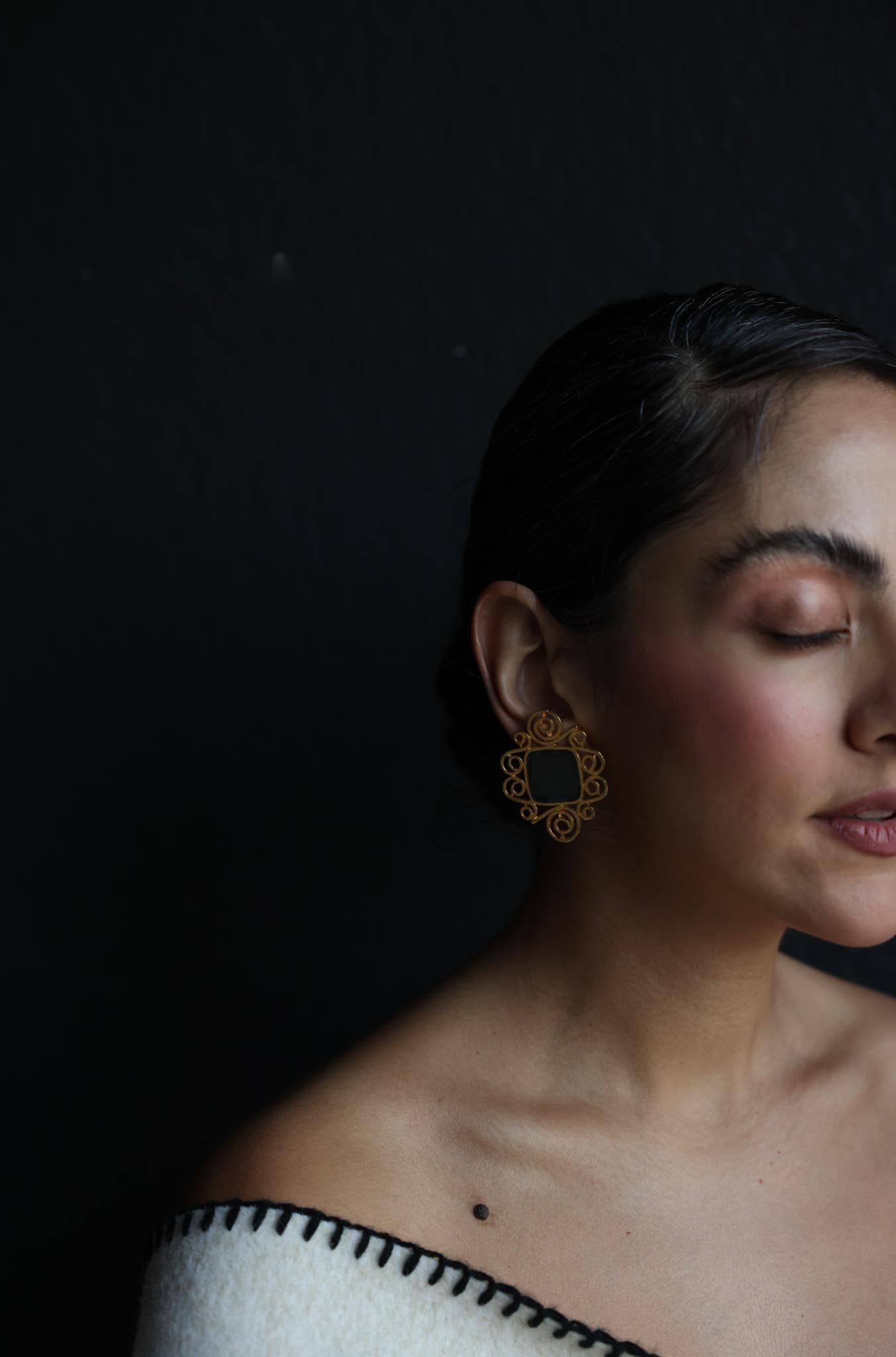Gold-Tone Scroll Clip-On Earrings with Black Centers