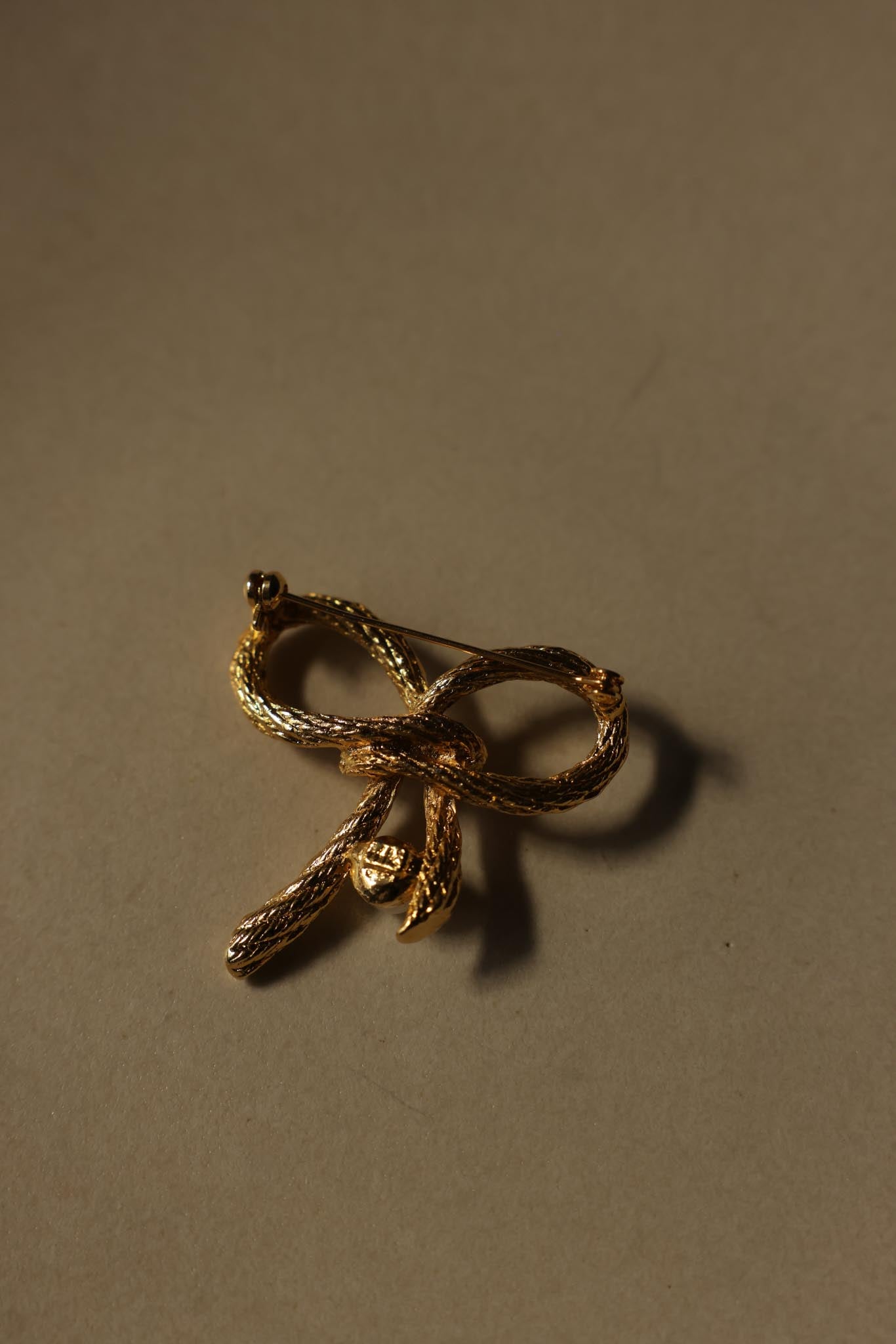 Gold-Tone Bow Brooch with Faux Pearl