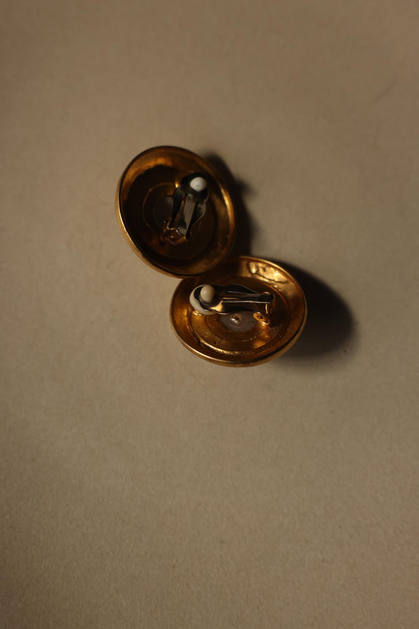 Matte Gold Clip-On Earrings with Black Cabochon