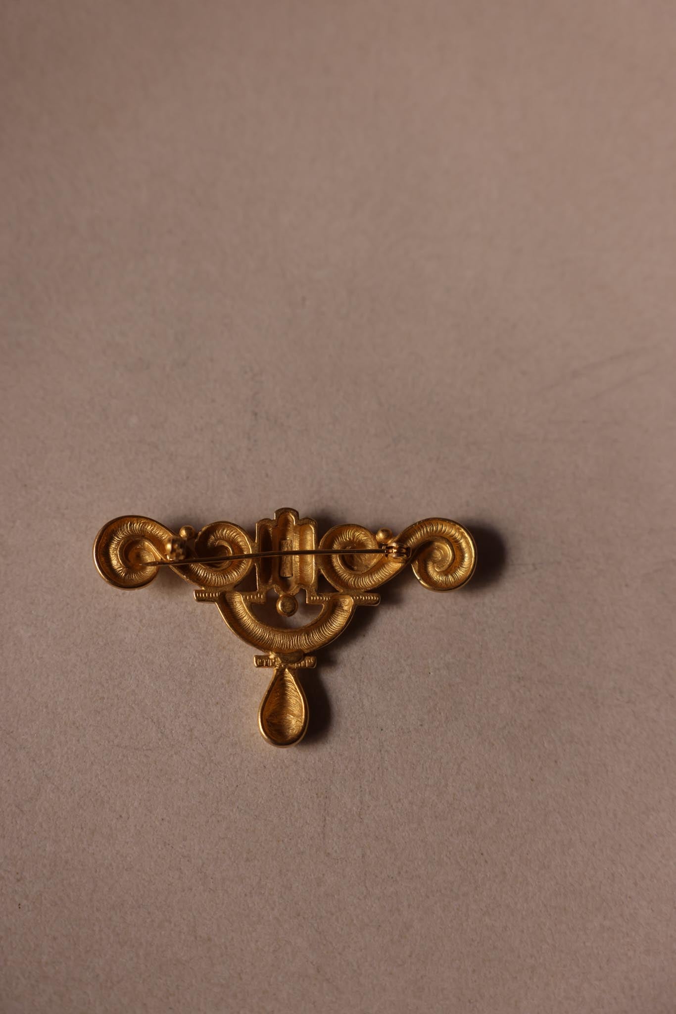 Matte Gold Scroll Brooch with Teardrop Accent