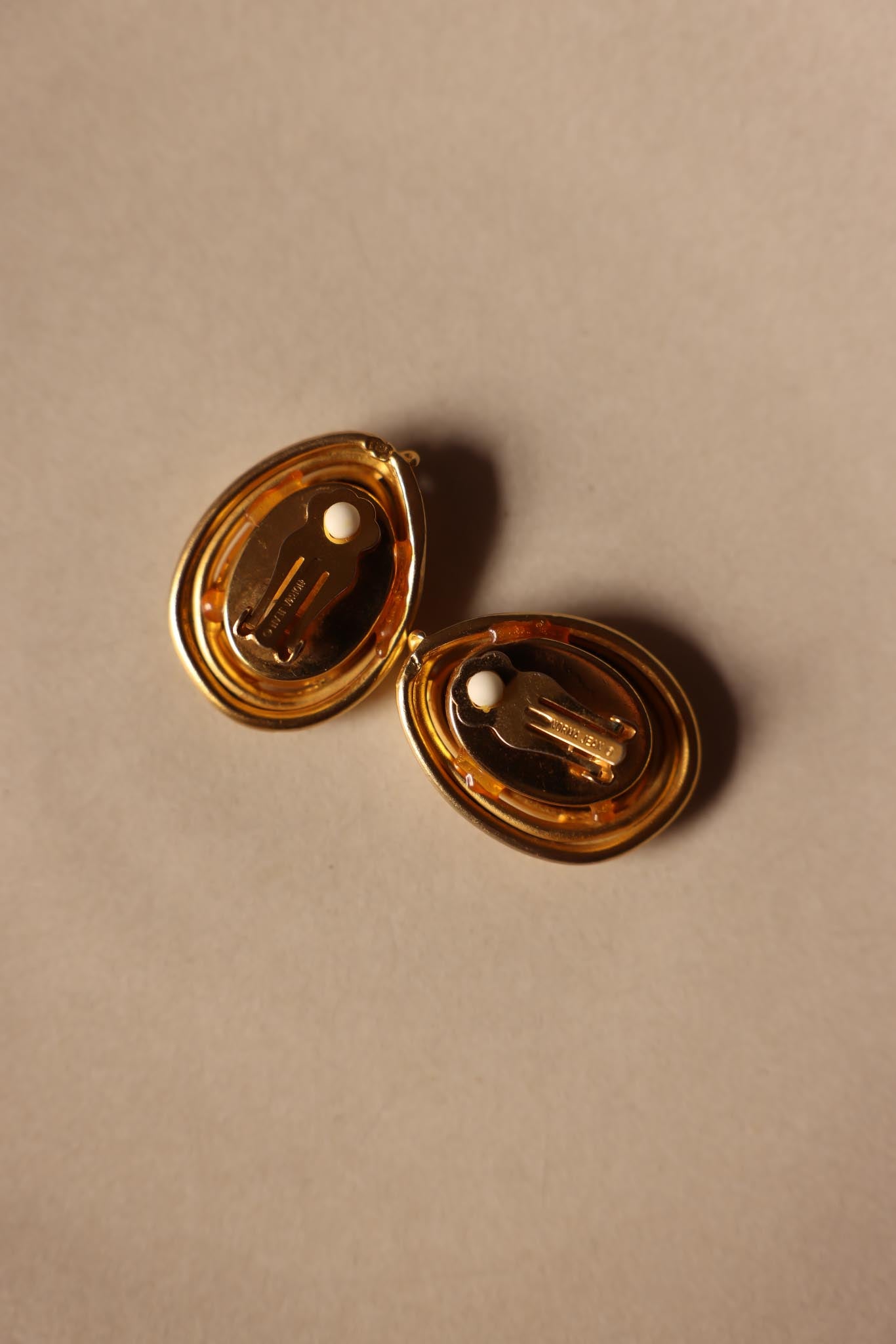 Norma Jean Matte Gold Teardrop Clip-Ons with Deep Amber Centers