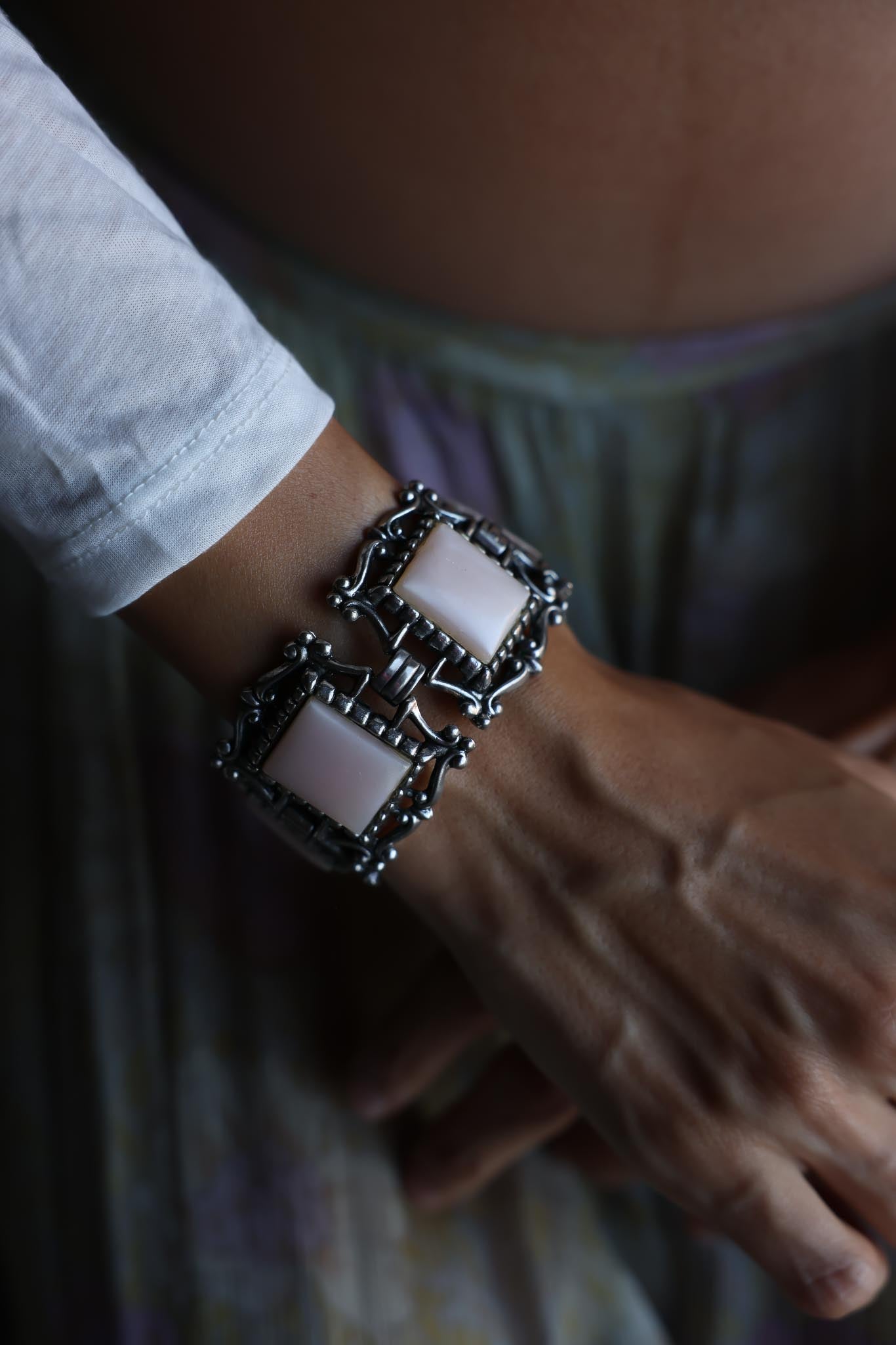 Silver-Tone Bracelet with Light Pink Cabochons