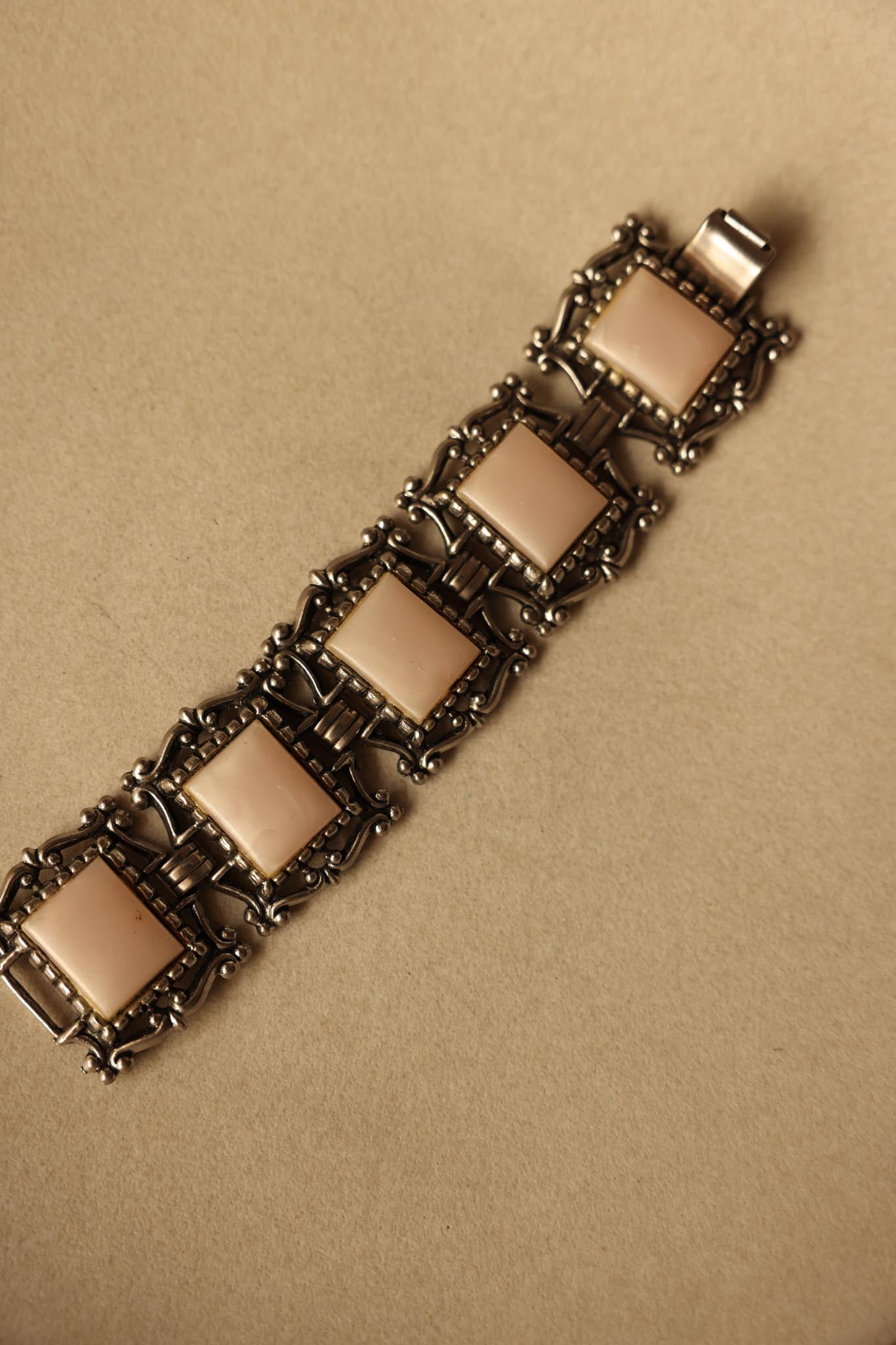 Silver-Tone Bracelet with Light Pink Cabochons