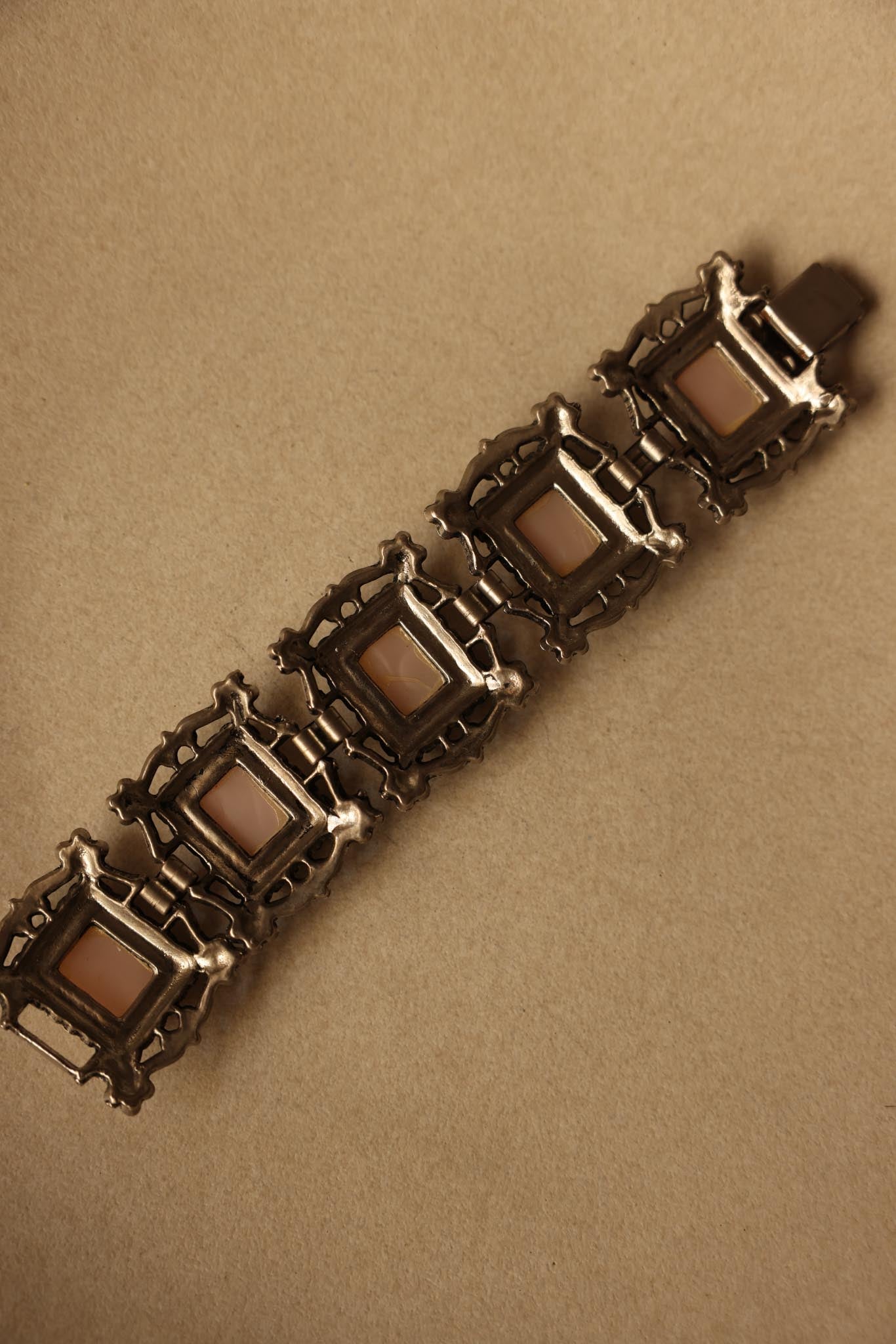 Silver-Tone Bracelet with Light Pink Cabochons