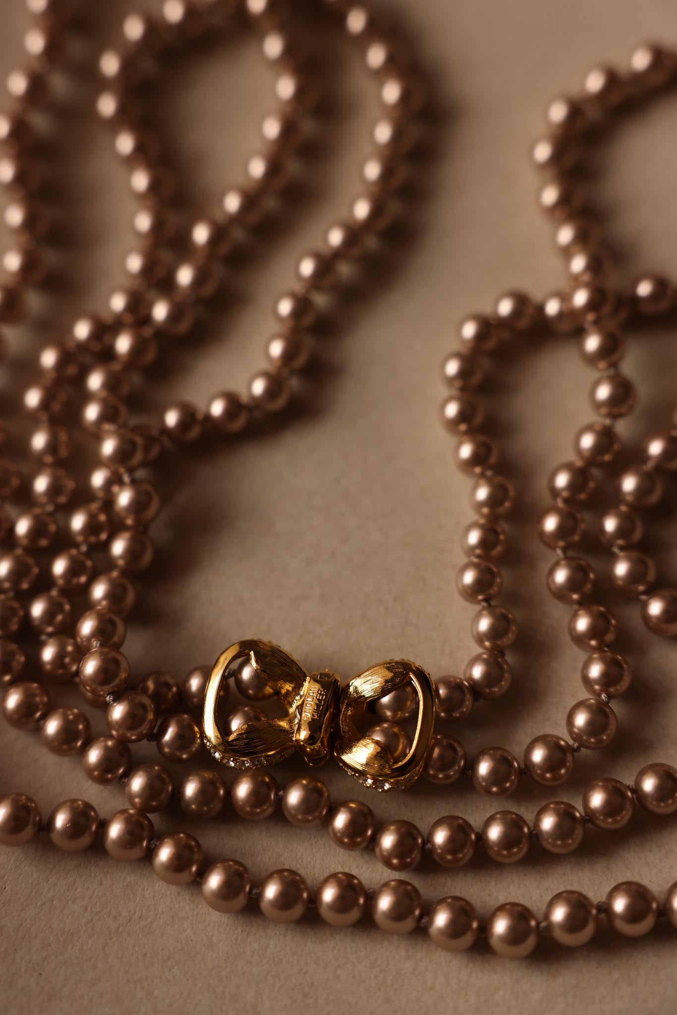 Nolan Miller Double Strand Faux Pearl Necklace with Rhinestone Bow Clasp|Vintage Baazaar