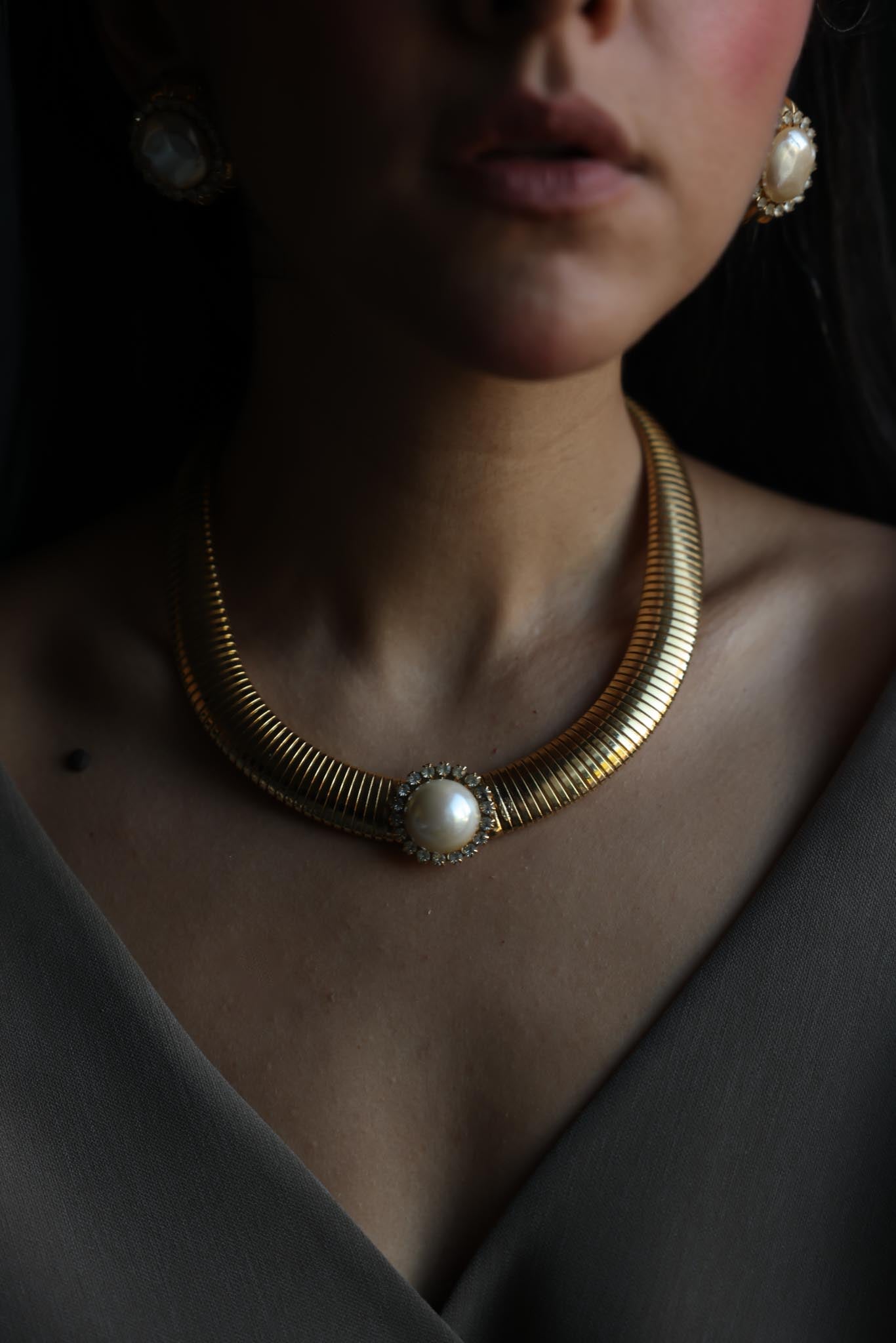 Gold Tone Omega Necklace with Faux Pearl & Rhinestone Center