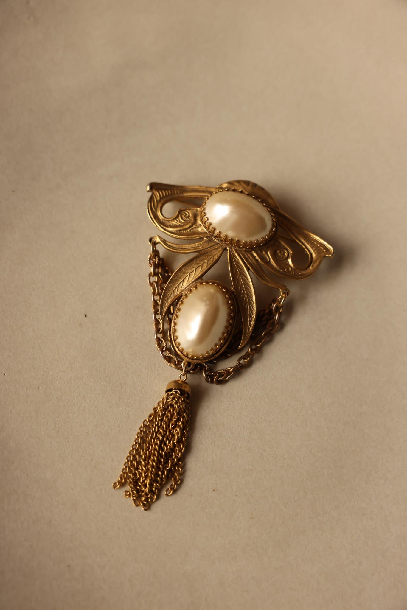Gold Tone Faux Pearl Brooch with Chain and Tassel