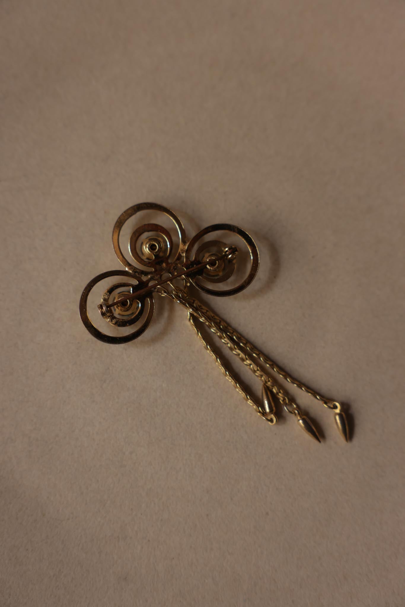 Gold-Tone Swirl Chain Tassel Brooch With Blue Rhinestones|Vintage Baazaar