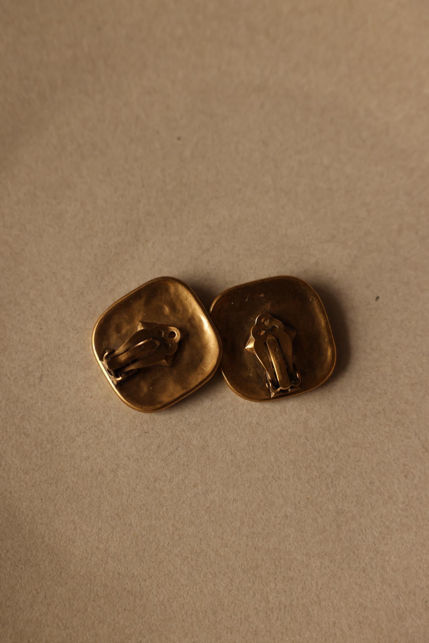 Trifari Matte Gold Clip-On Earrings with Black Center