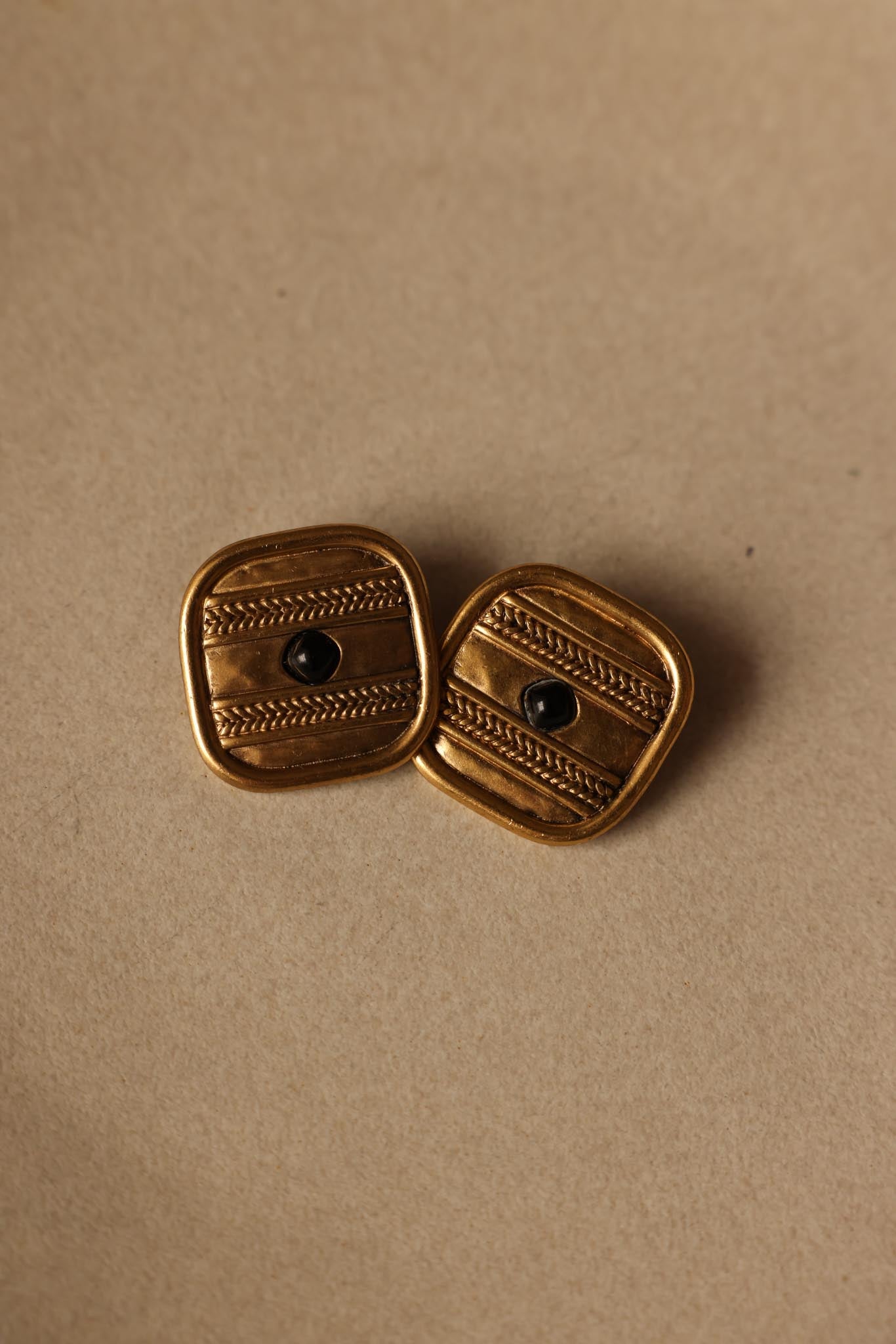 Trifari Matte Gold Clip-On Earrings with Black Center