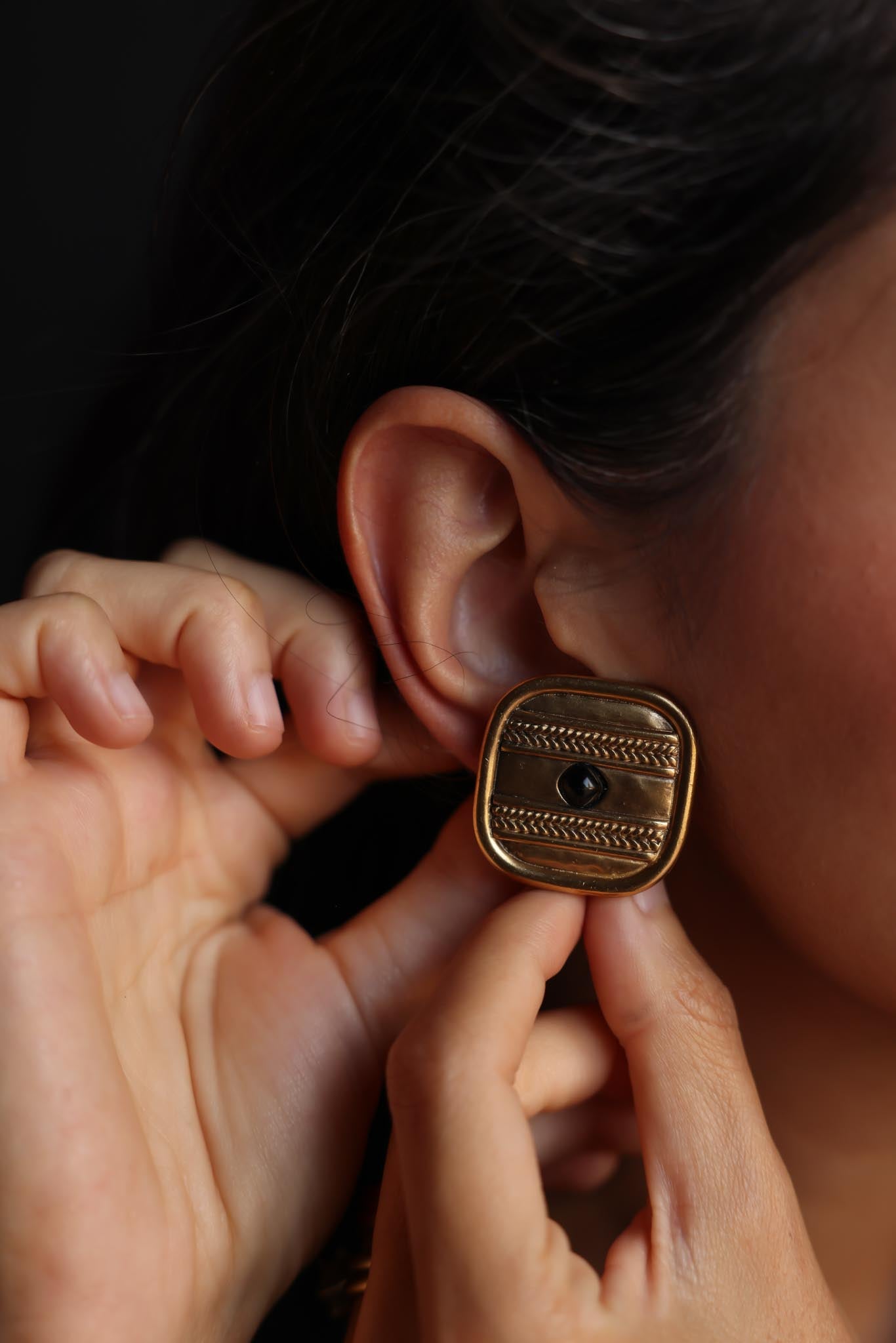 Trifari Matte Gold Clip-On Earrings with Black Center