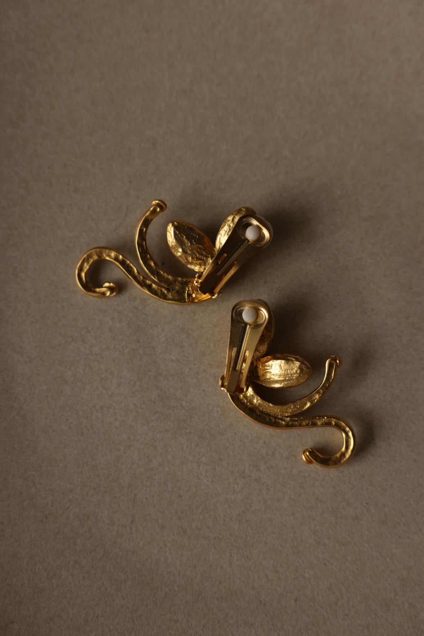 Gold Tone Swirl Statement Clip-On Earrings