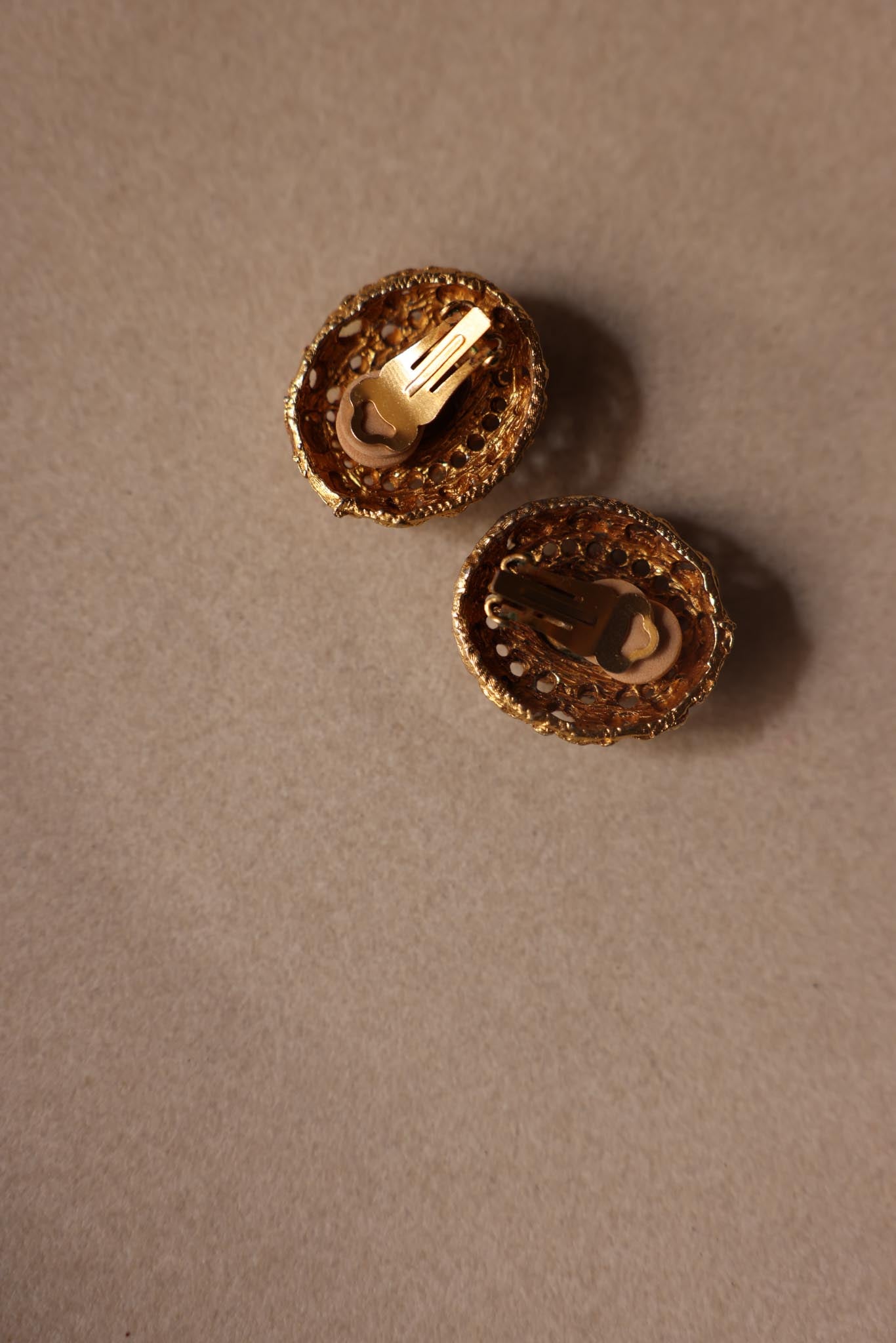 Ornate Filigree Clip-On Earrings with Pale Green Faceted Center