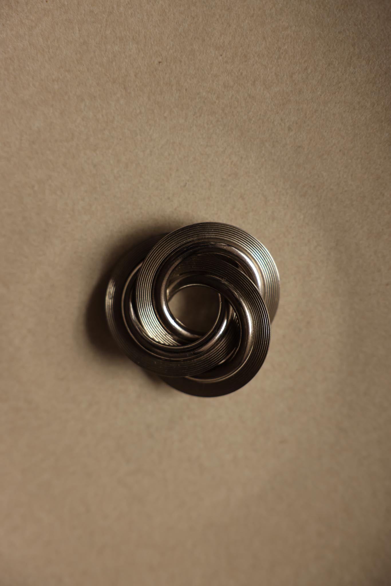Silver-Tone Interlocking Knot Brooch|Vintage Baazaar 