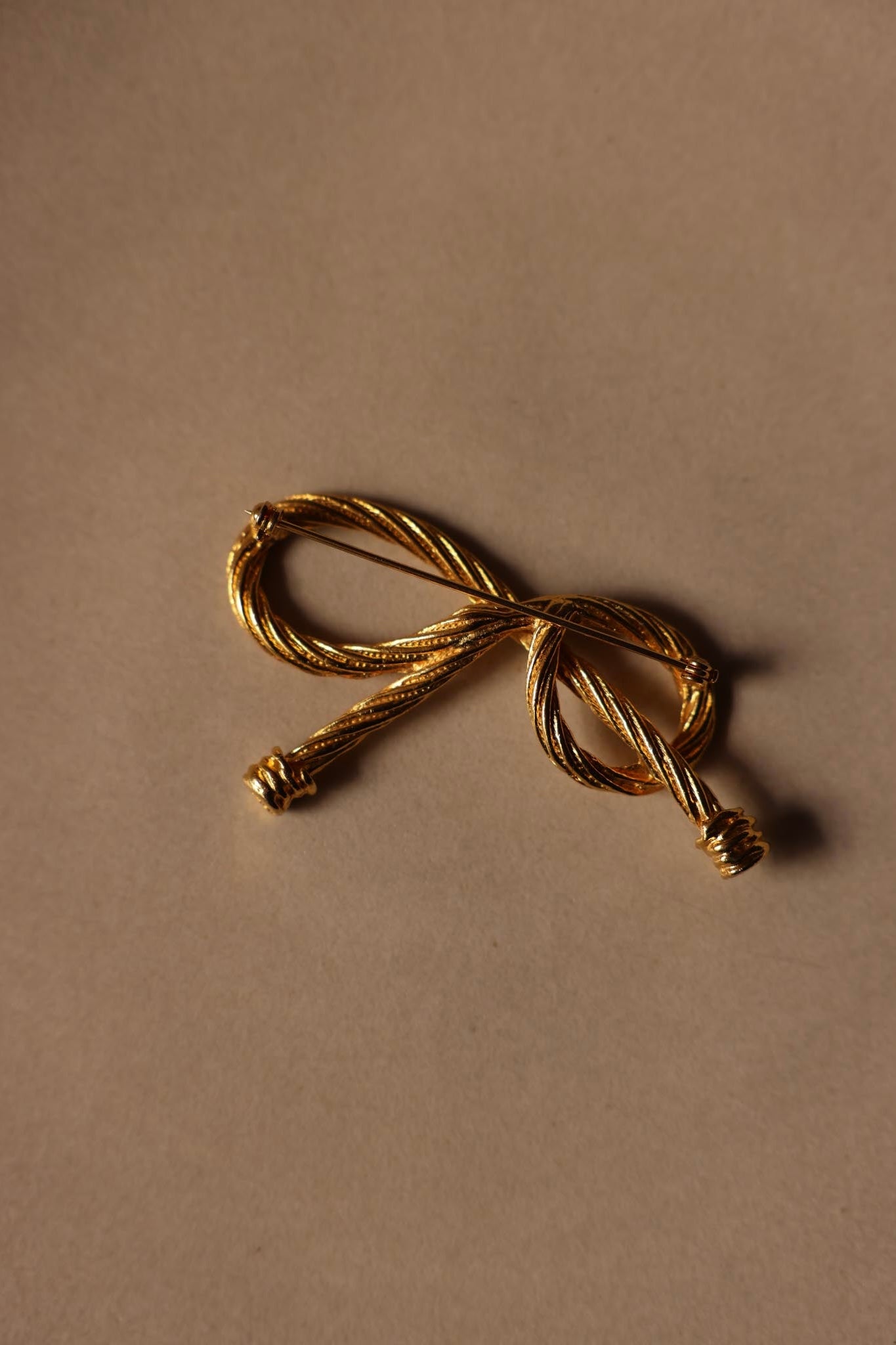 Golden Bow Rope Brooch
