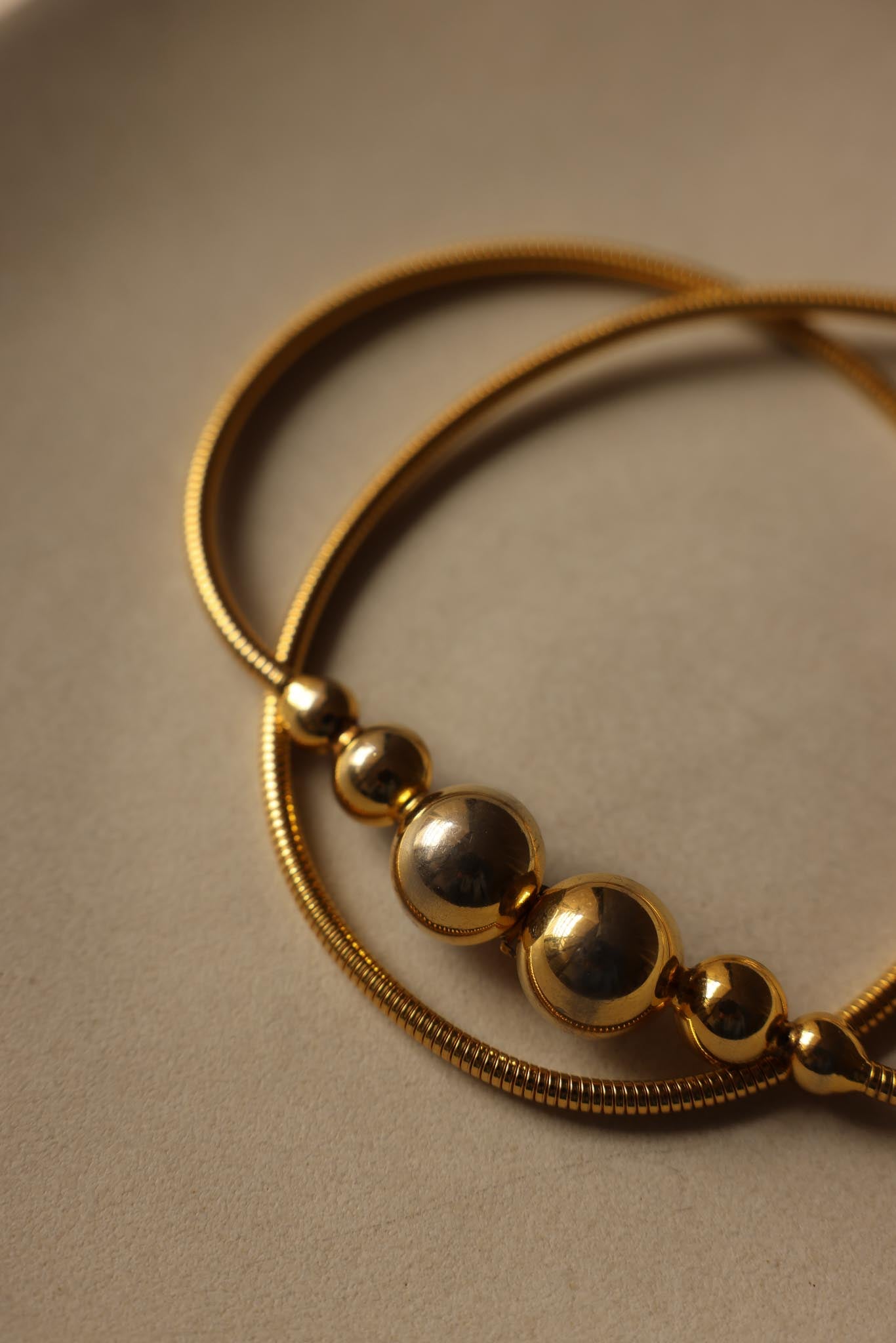 Gold-Tone Stretch Belt with Beaded Accent, 1980s|Vintage Baazaar 