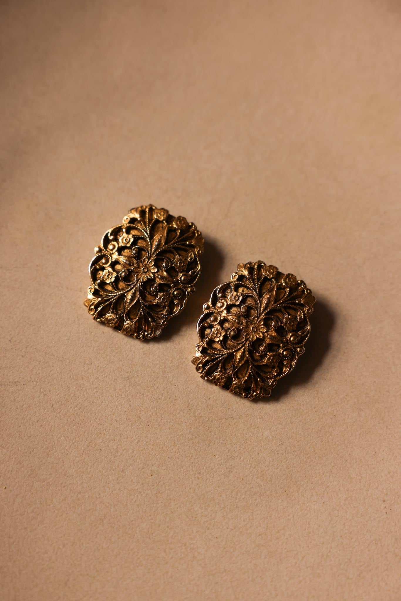 Gold-Tone Floral Embossed Clip-On Earrings Signed M.E. – 1980s