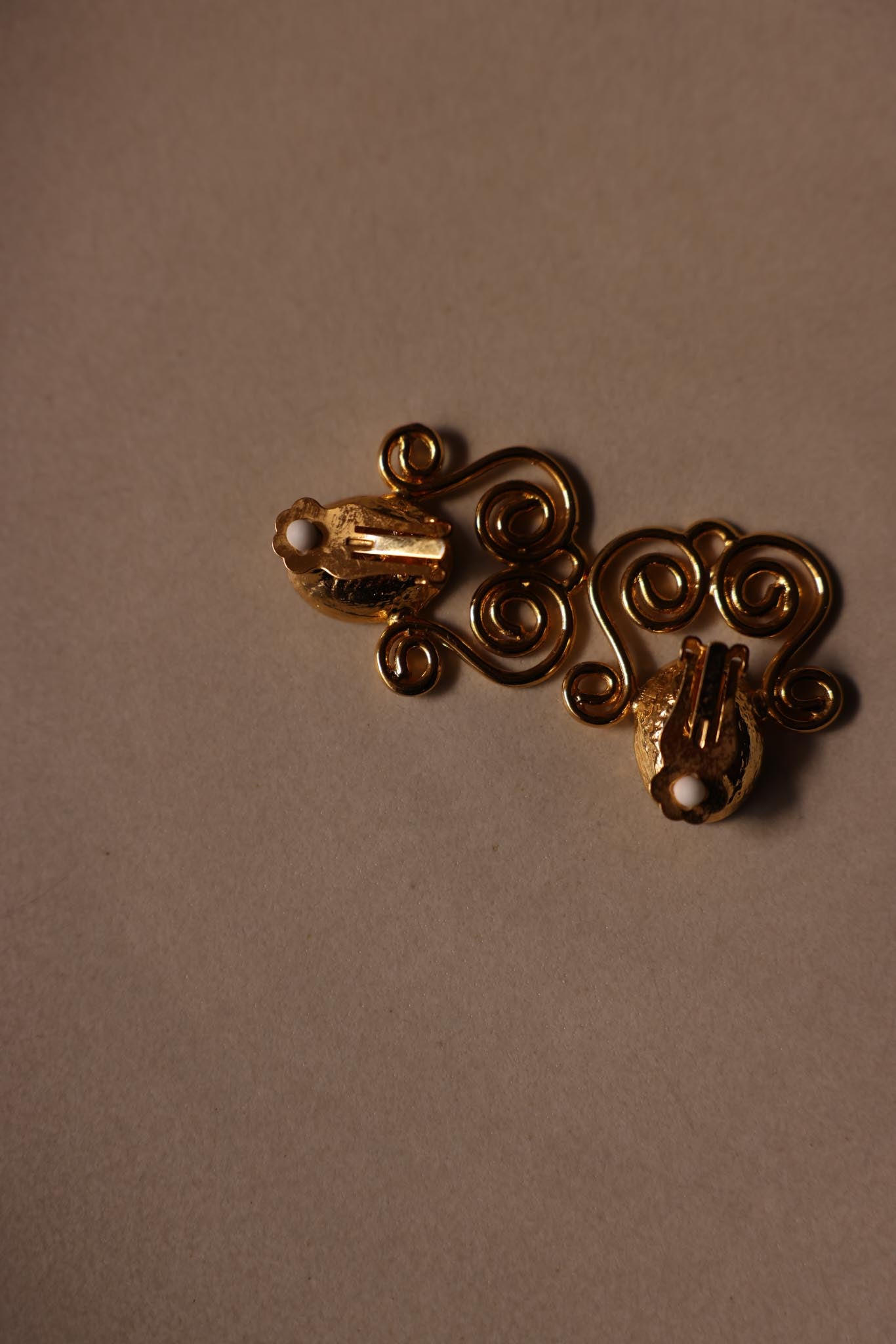 Gold-Tone Scroll Clip-On Earrings with Clear Light Green Cabochons
