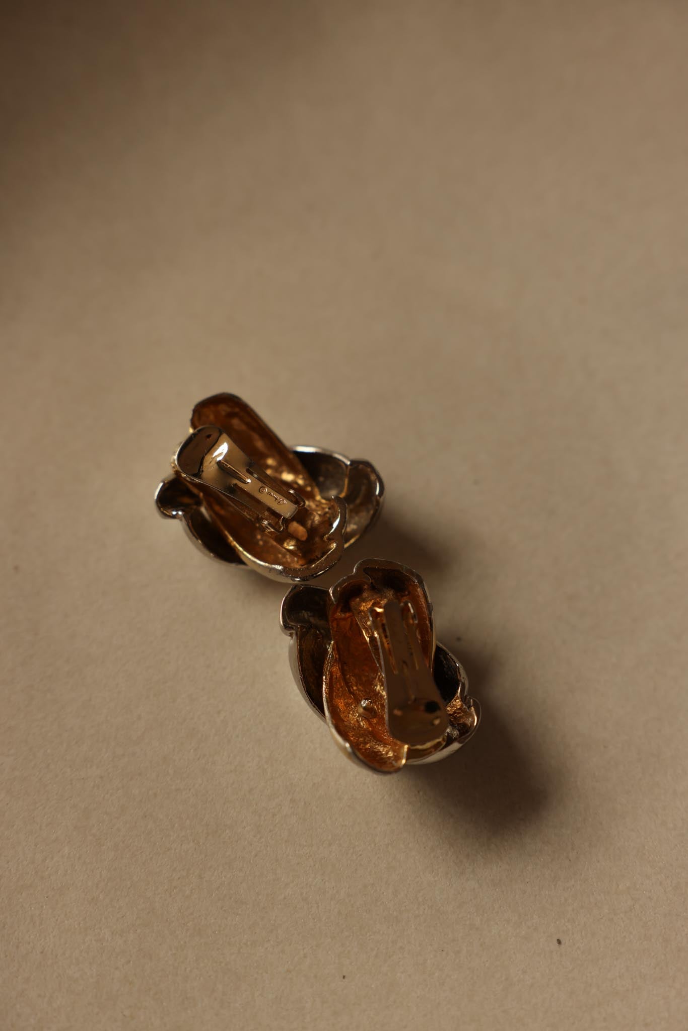 Two-Tone Clip-On Earrings with Bold Knot Design