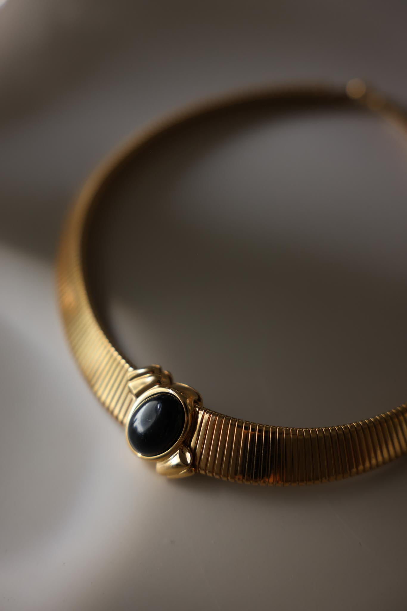 Monet Gold-Tone Omega Collar Necklace with Black Pendant
