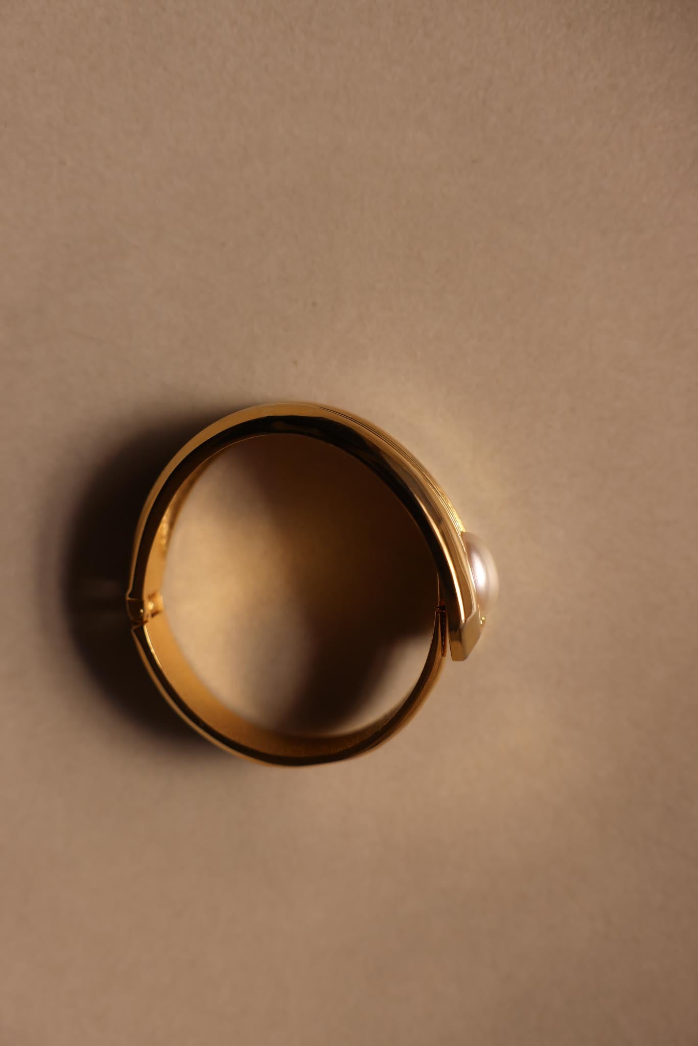 Gold-Tone Hinged Faux Pearl Bracelet