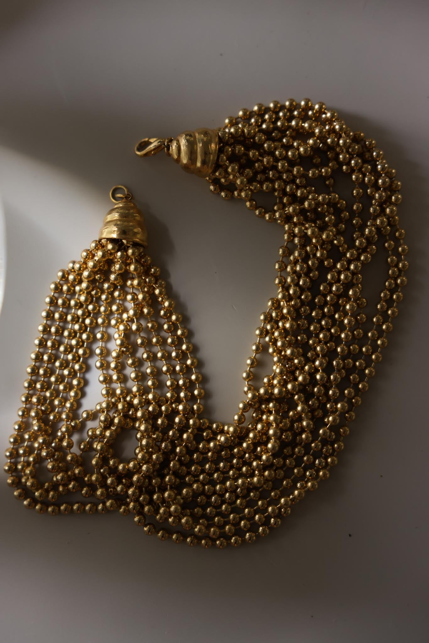 Gold Tone Multi Strand Beaded Statement Necklace