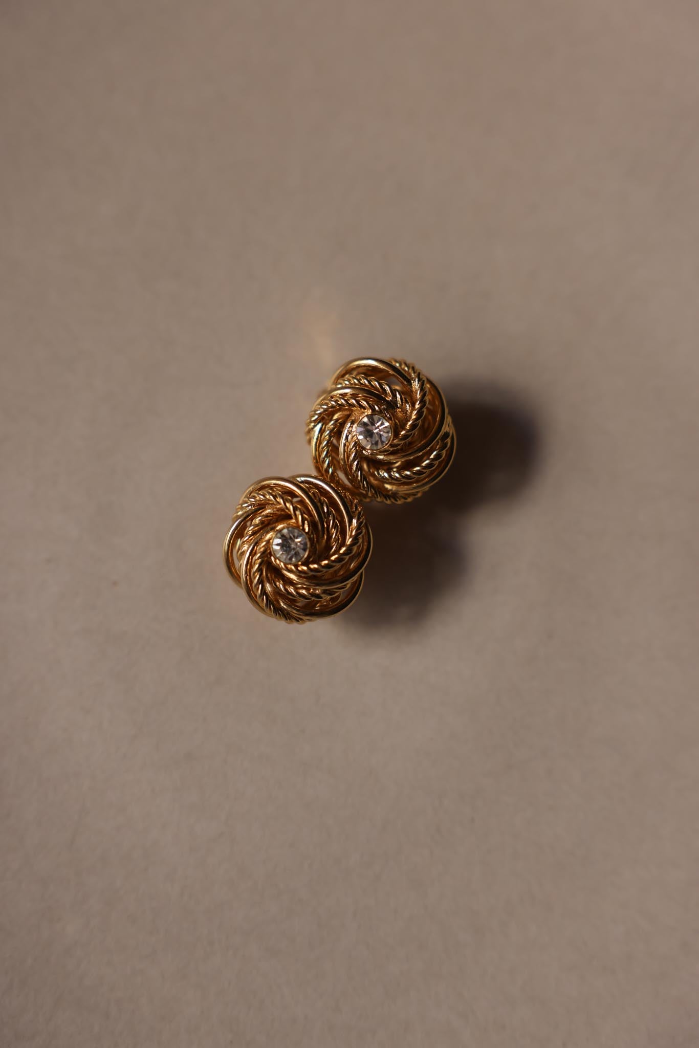 Gold Rope Swirl Clip-On Earrings with Rhinestone Center