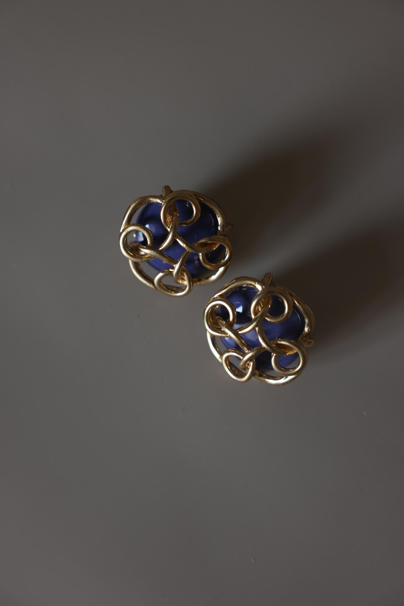 Gold Tone Purple Enamel Knot Clip-On Earrings