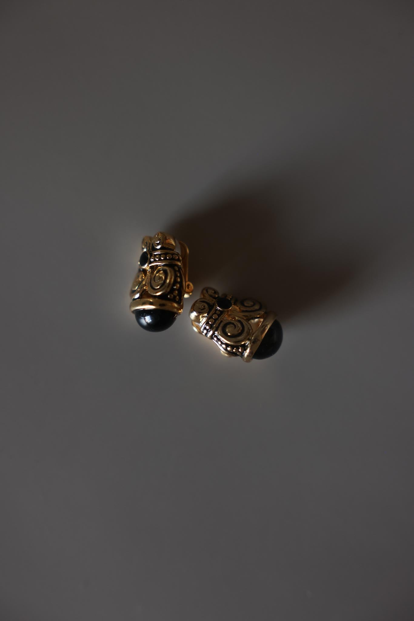 Gold Tone Black Cabochon Scroll Clip-On Earrings