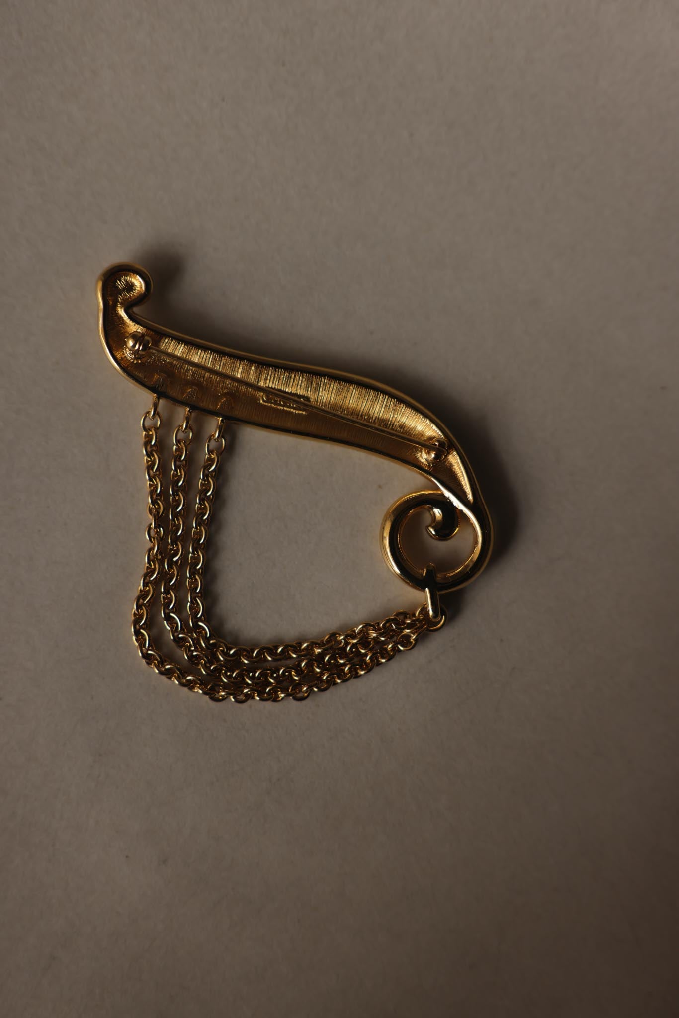 Gold Tone Scroll Brooch with Draped Chains