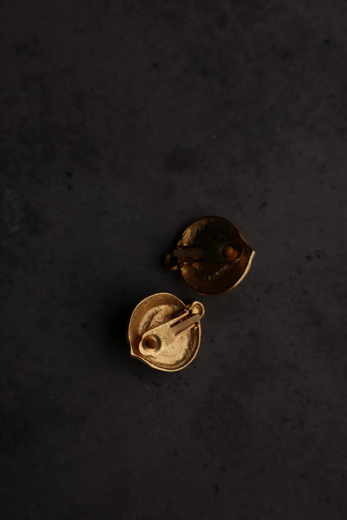 Matte Gold Swirl Clip-On Earrings with Red Cabochons