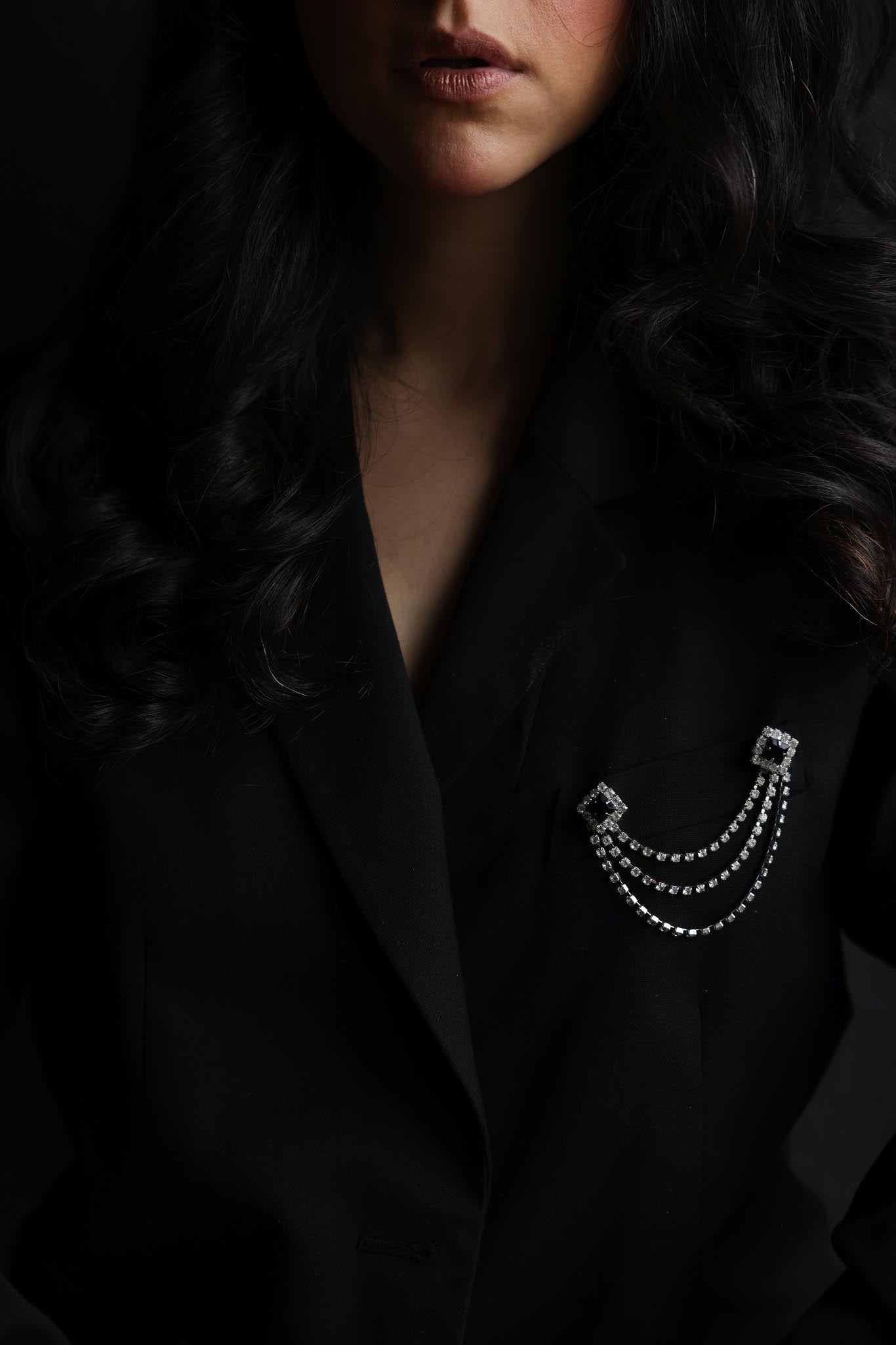 Black and Clear Rhinestone Draped Chain Brooch