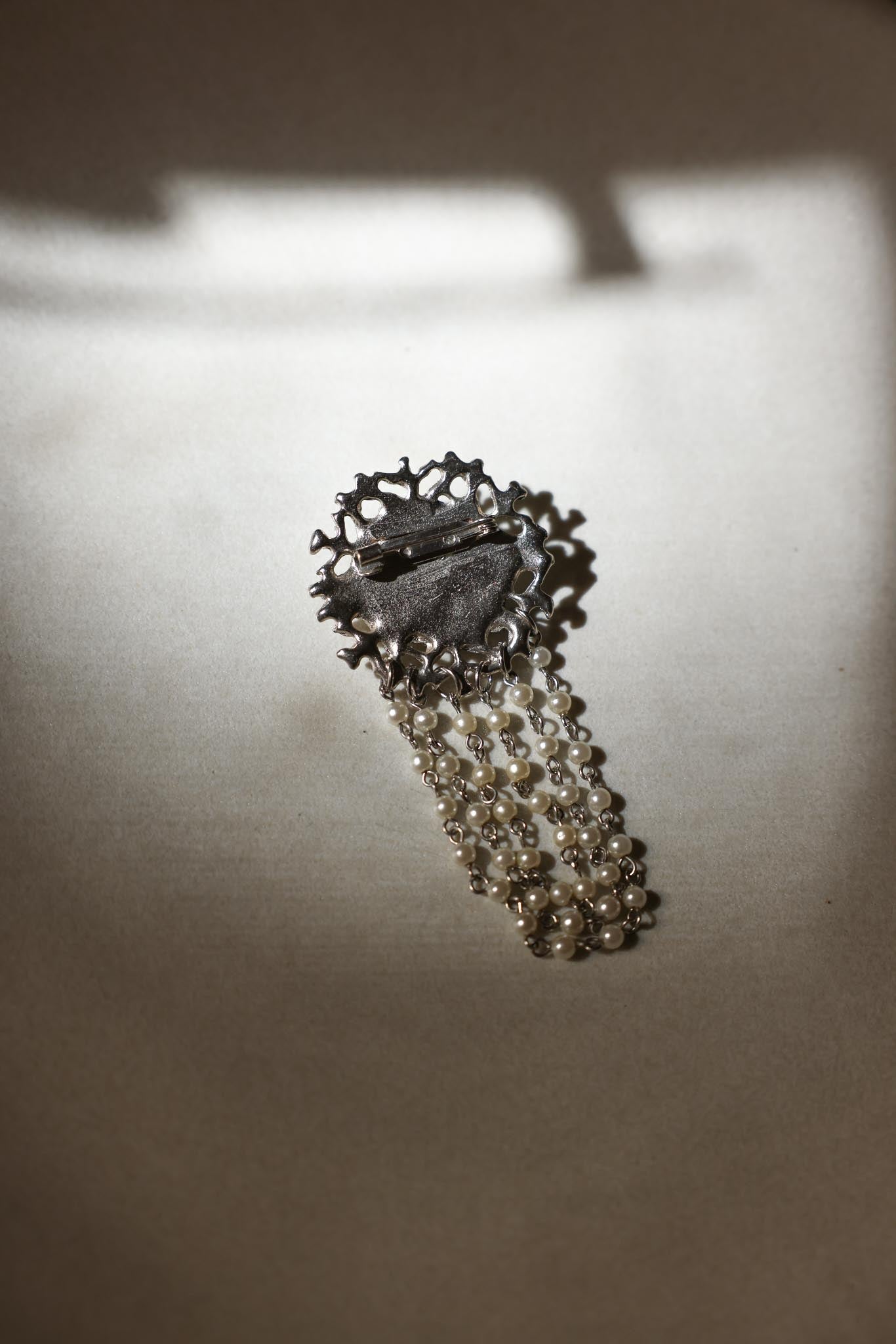 Silver-Tone Brooch with Faux Pearl and Draped Beaded Chains