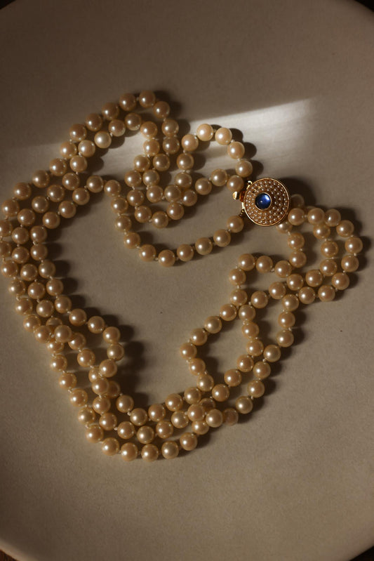 Gold-Tone Triple-Strand Faux Pearl Necklace with Blue Rhinestone Clasp