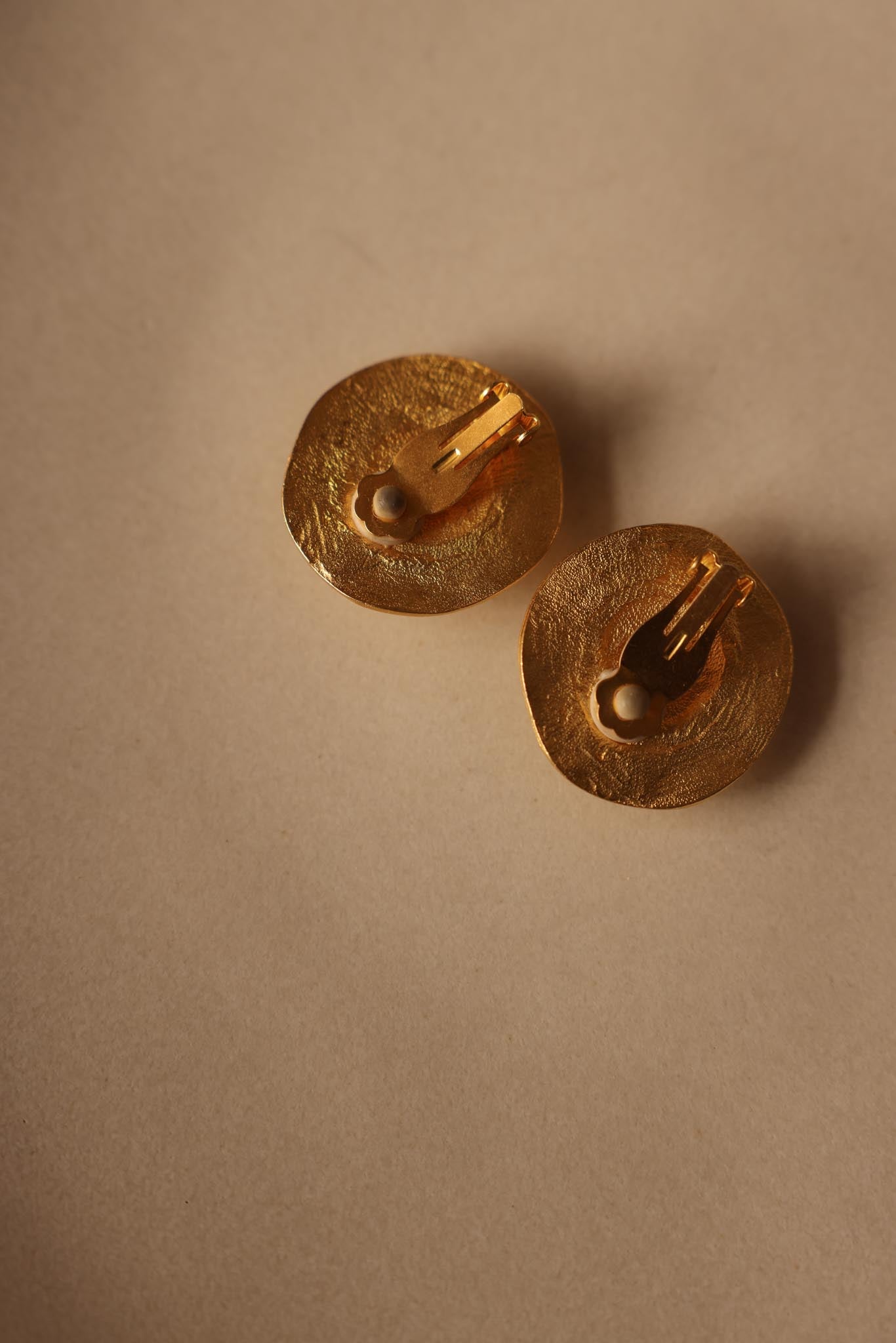 Oversized Round Gold-Tone Clip-On Earrings with White Cabochon Center