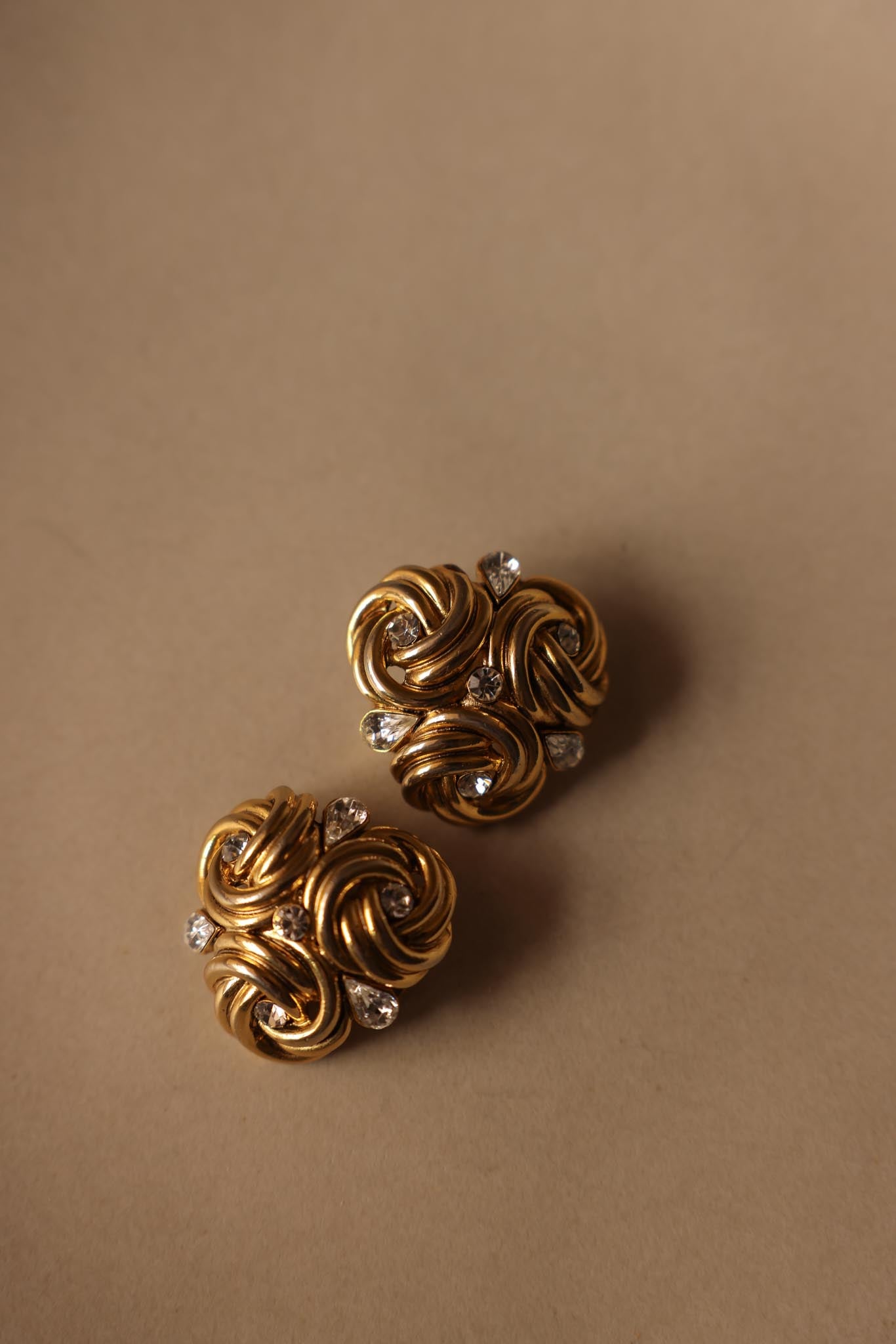 Oversized Knot Gold-Tone Clip-On Earrings with Clear Rhinestones