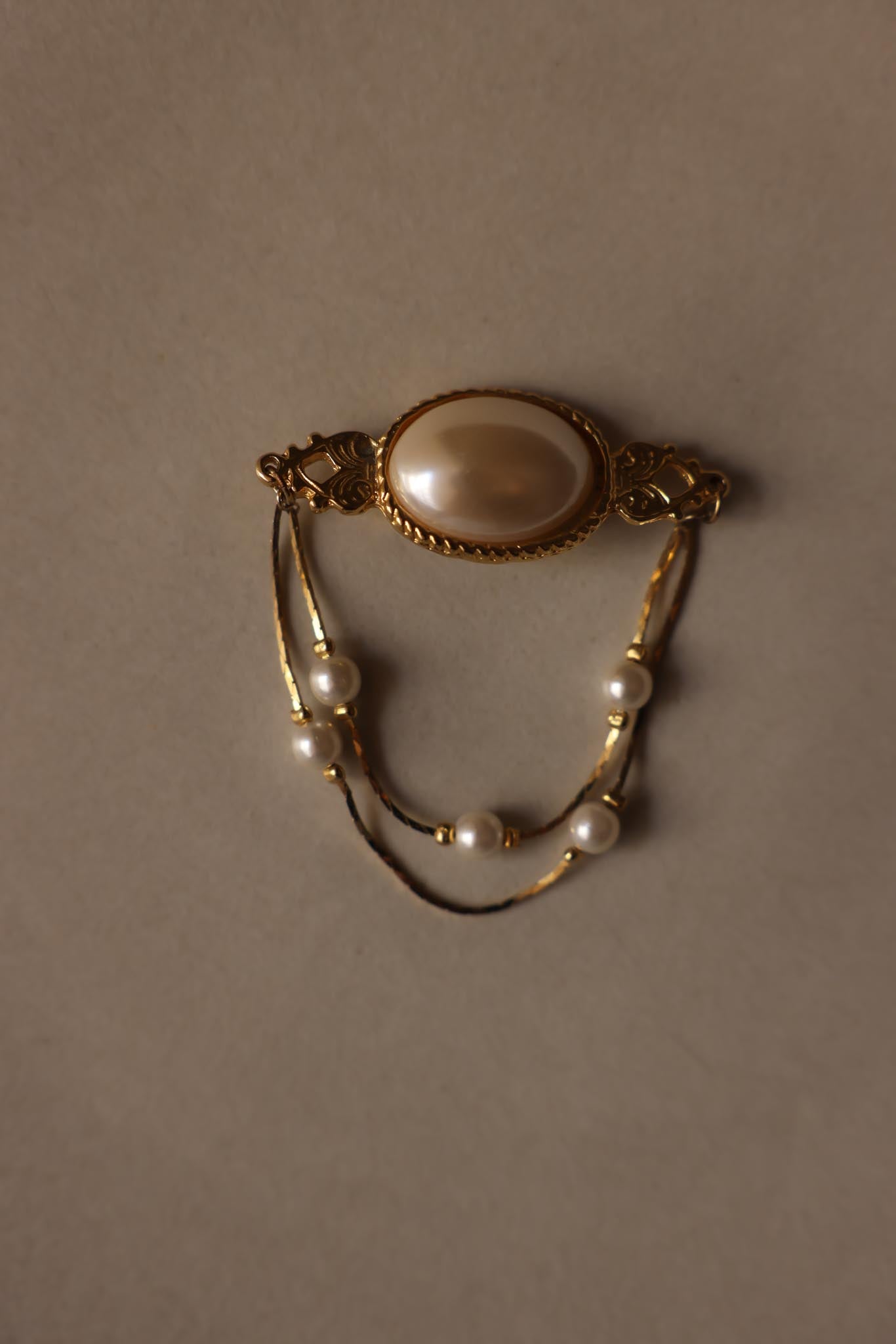 Gold-Tone Faux Pearl Chain Brooch with Draped Detail|Vintage Baazaar 