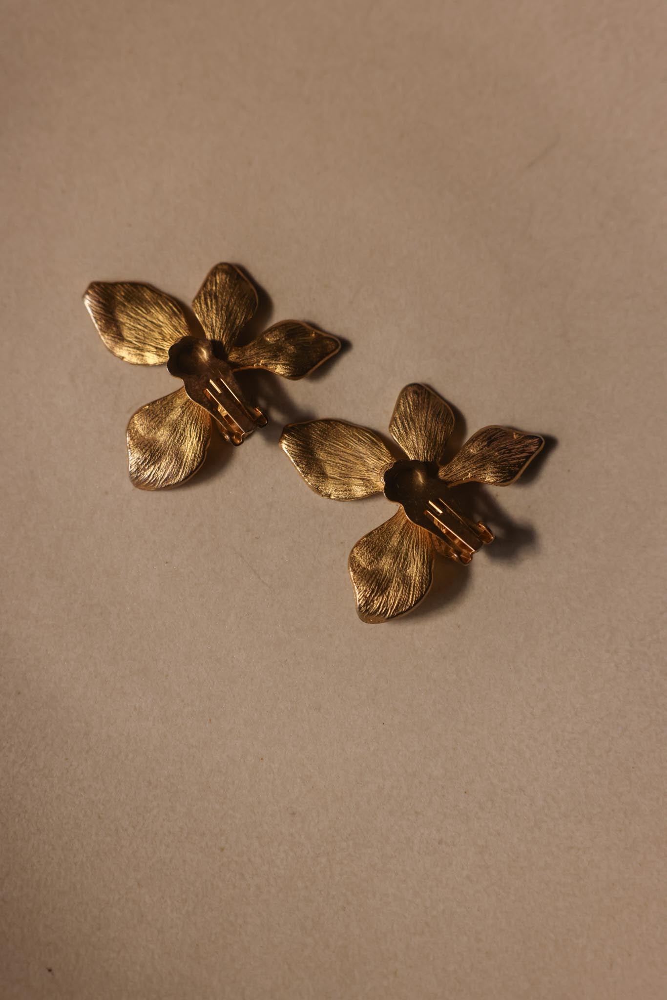 Brushed Gold Floral Clip-On Earrings with Rhinestone Center