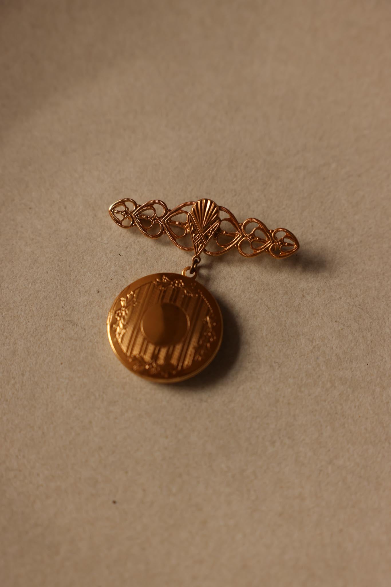Gold Locket Brooch with Filigree Detail