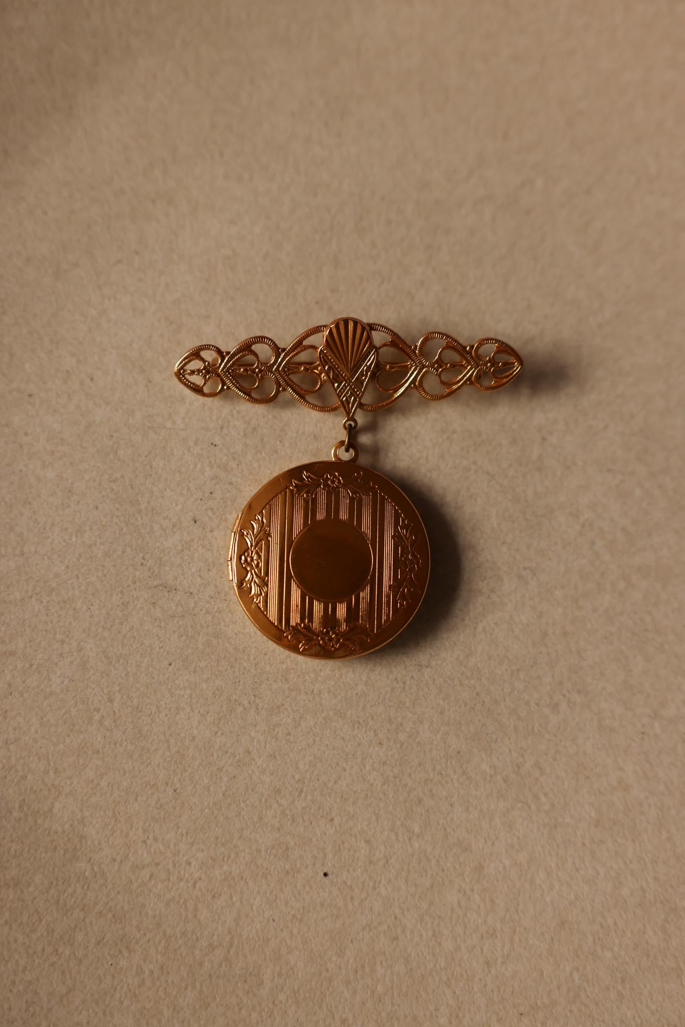 Gold Locket Brooch with Filigree Detail