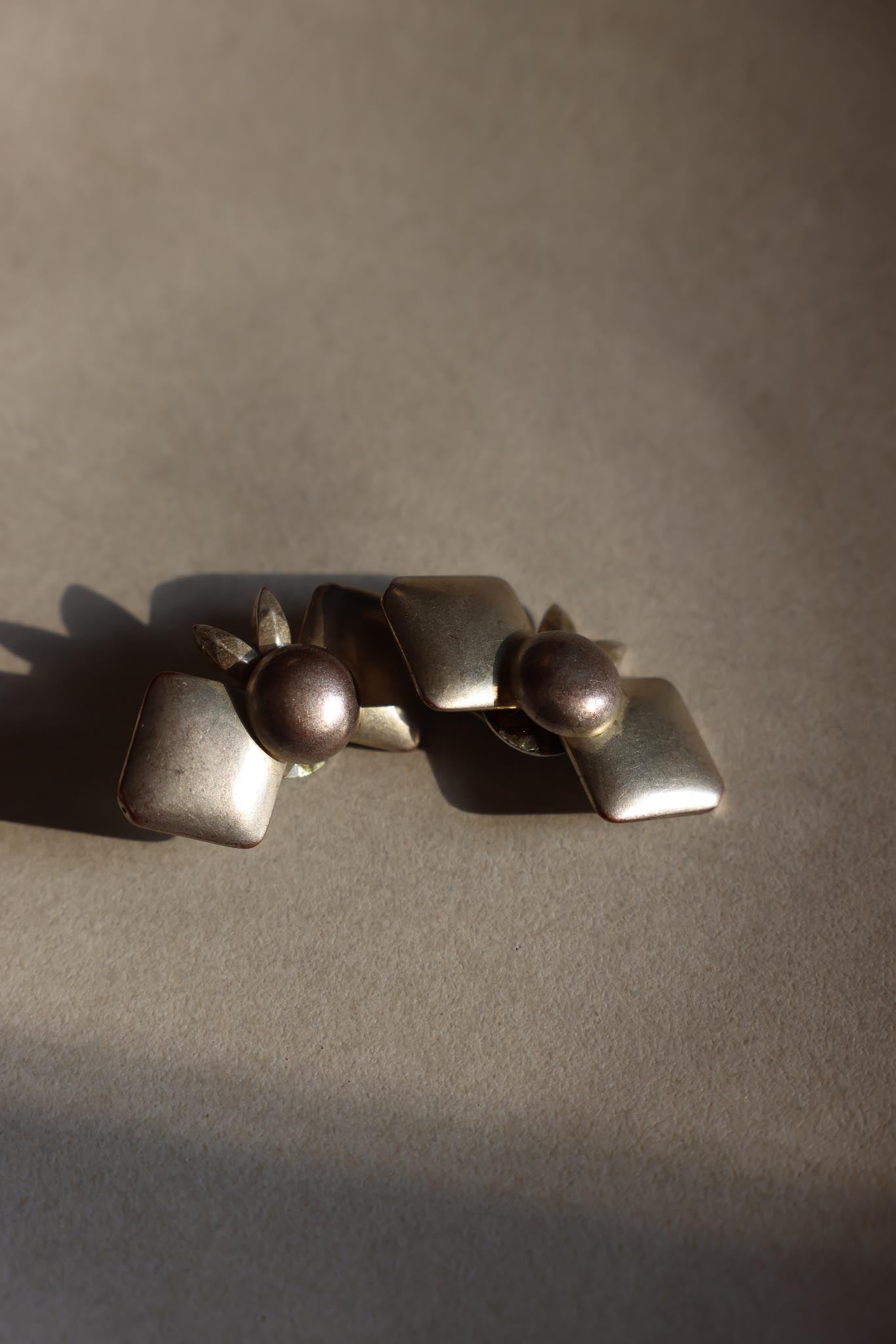 Geometric Silver Bow Clip-On Earrings