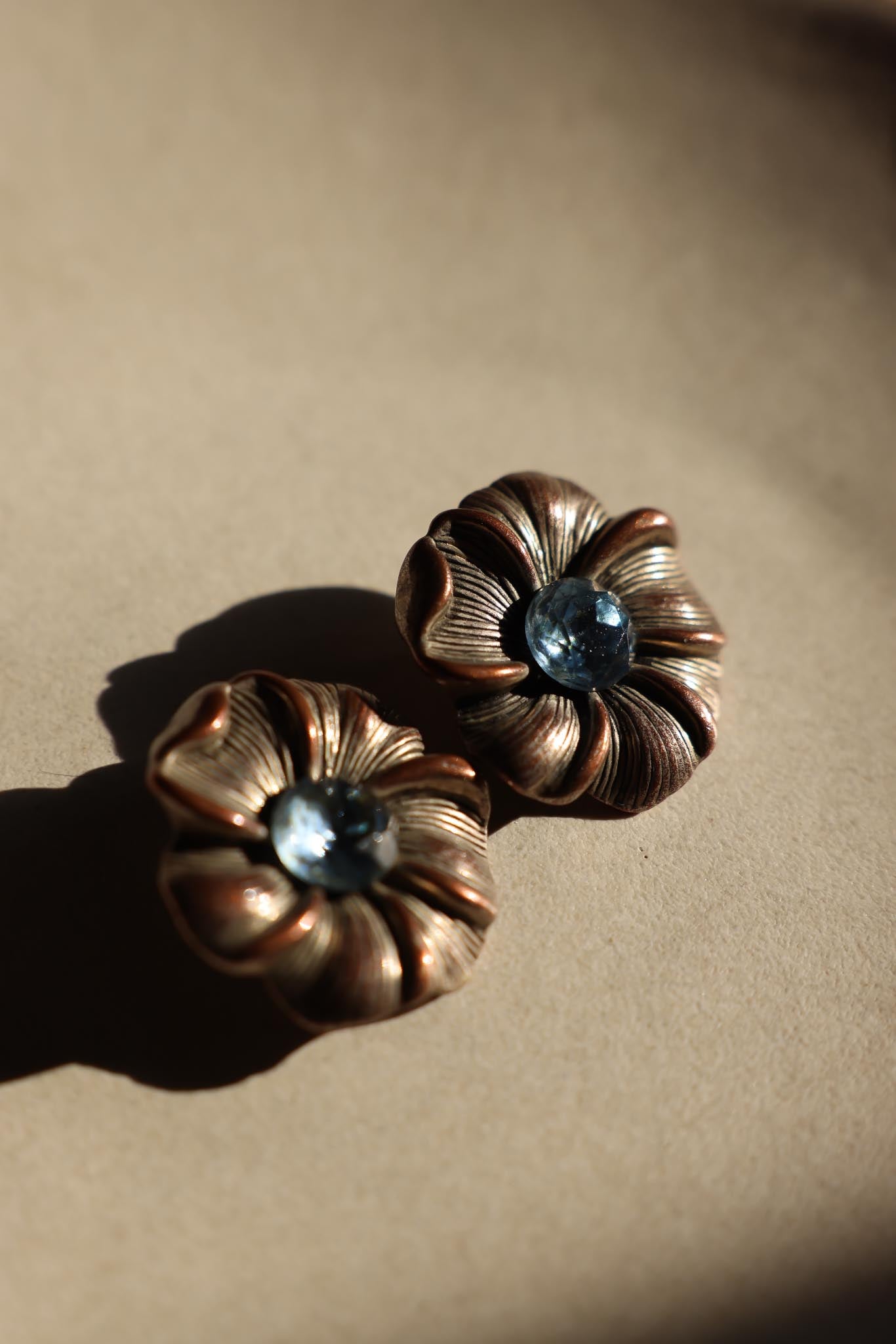 Silver Flower Clip-On Earrings with Blue Cabochon