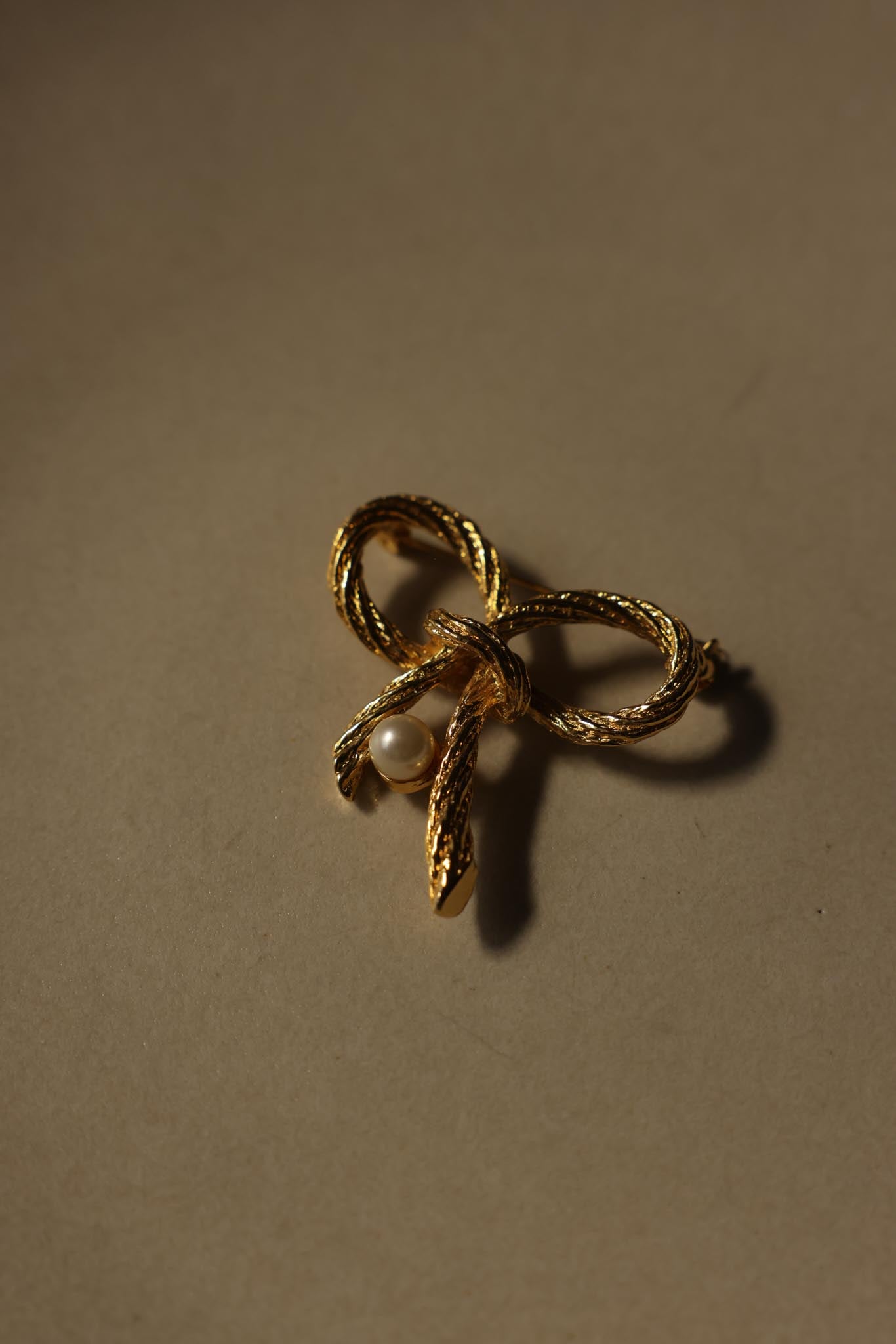 Gold-Tone Bow Brooch with Faux Pearl