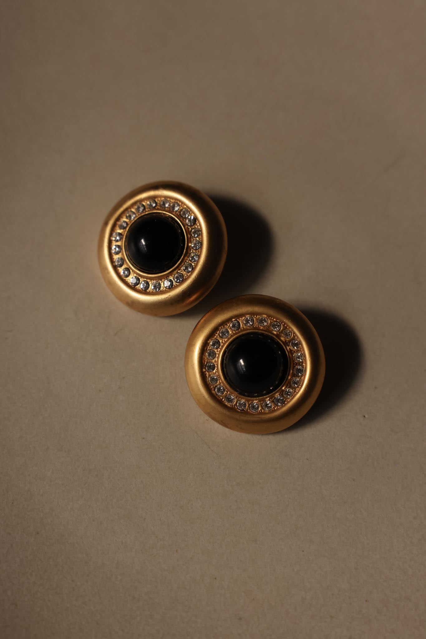 Matte Gold Clip-On Earrings with Black Cabochon